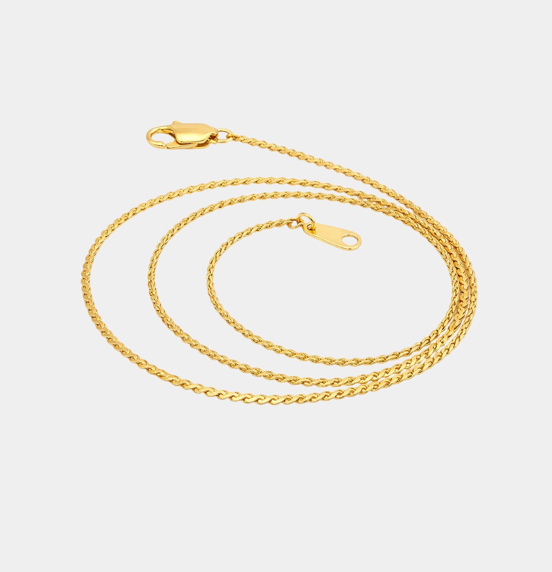 MH Elegance 24K gold plated serpentine chain shown coiled to show the sleek, flexible chain
