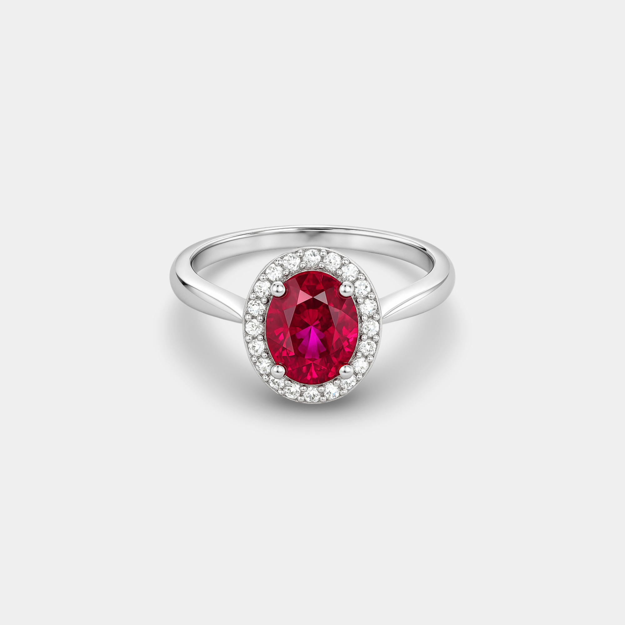 White Gold Oval Ruby & Diamond Halo Ring
