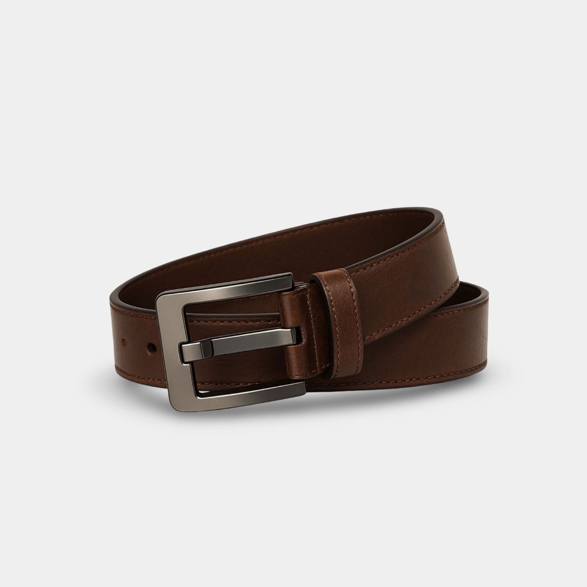 Premium Italian cowhide leather texture on TSA-approved non-metal buckle belt, brown color, durable and hypoallergenic for men