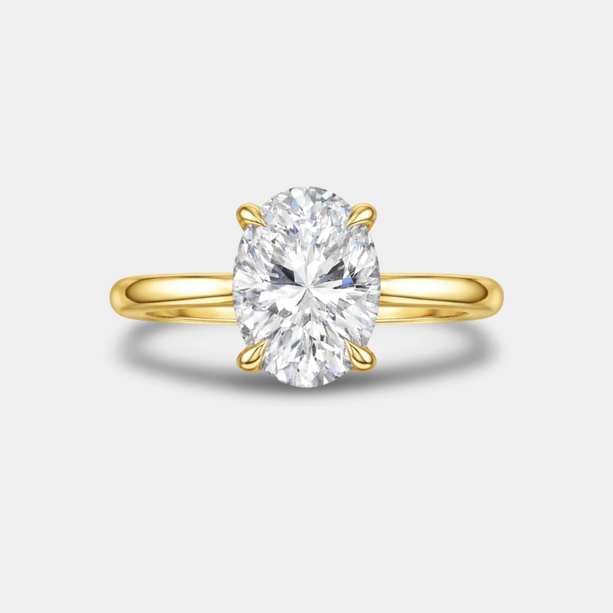 Woman wearing the 3CT oval solitaire CZ ring on her hand as an engagement or promise ring