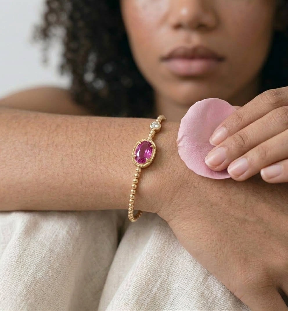 Pink crystal stretch bracelet styled on a wrist for everyday wear