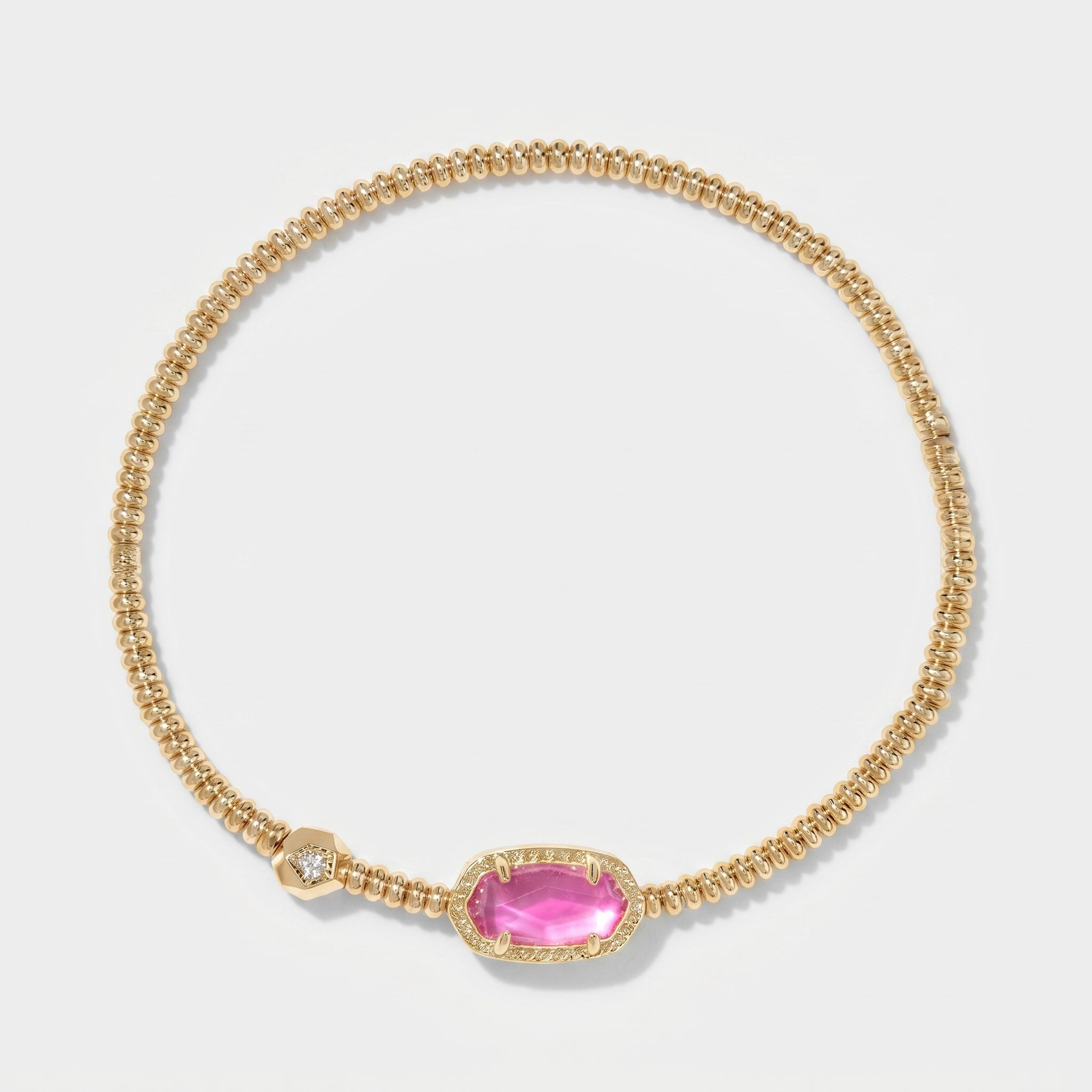 Pink crystal gold beaded stretch bracelet with a pave halo center stone