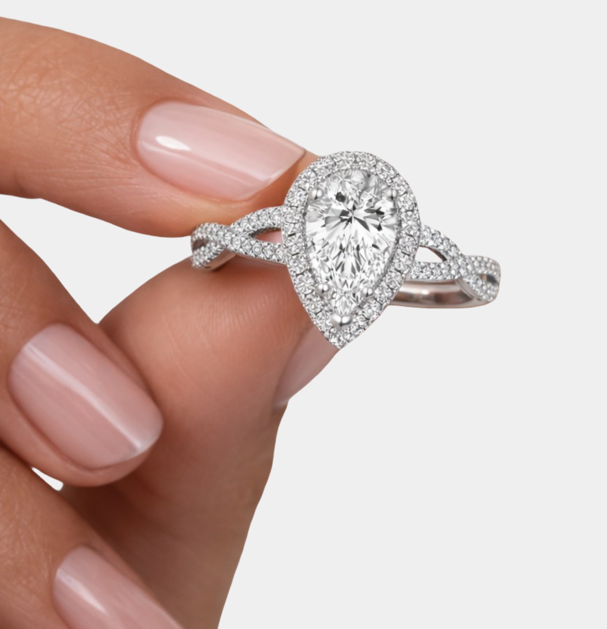 Royal Twisted Halo Pear Engagement Ring