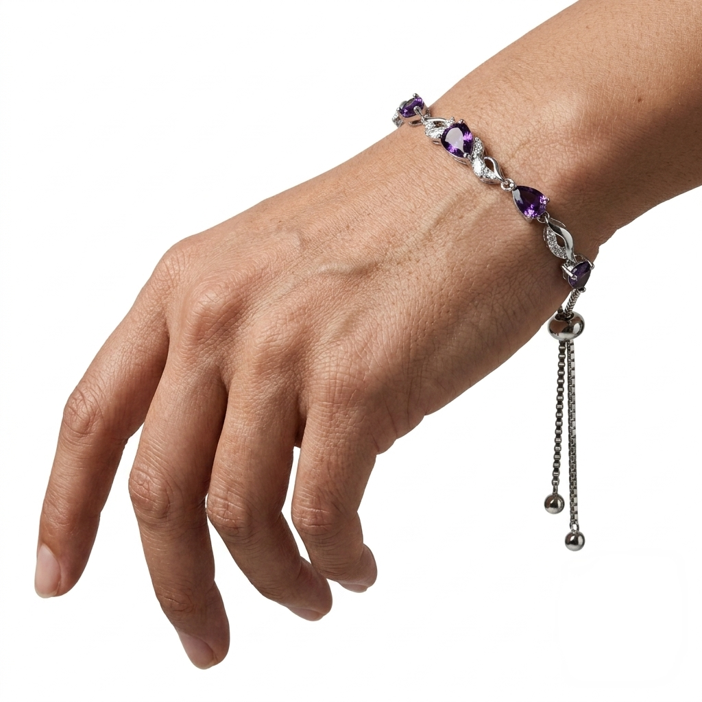Sterling silver amethyst bracelet with bolo adjustable chain draped on wrist