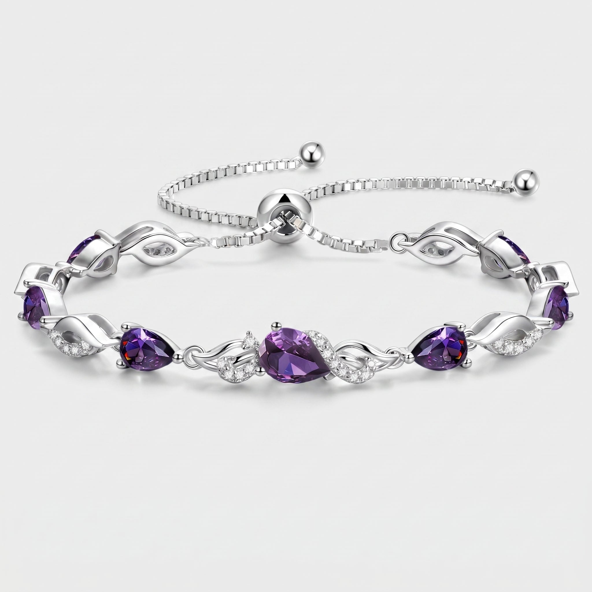 Sterling silver amethyst teardrop tennis bracelet with adjustable bolo chain on white background