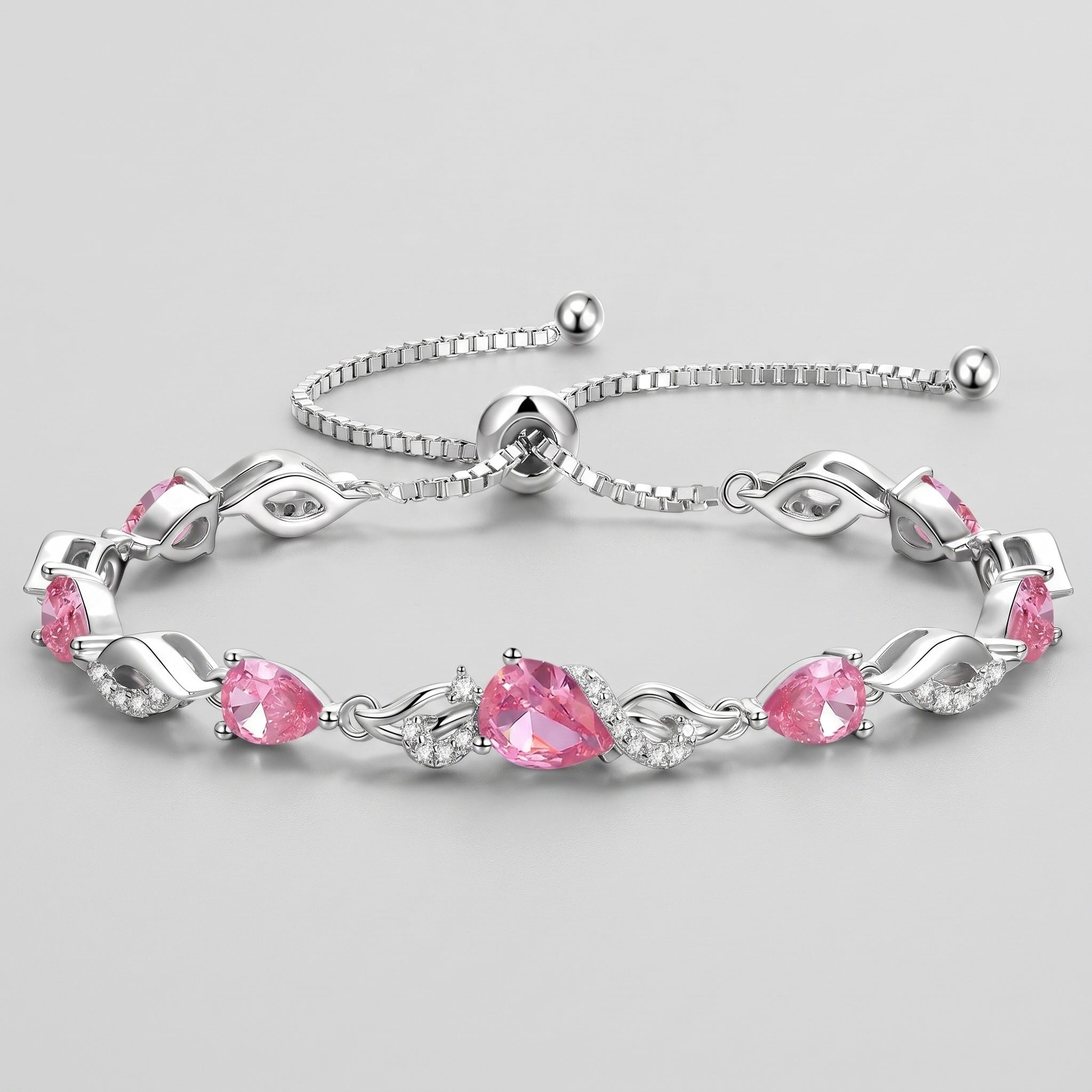 Pink tourmaline teardrop tennis bracelet in sterling silver with adjustable bolo clasp
