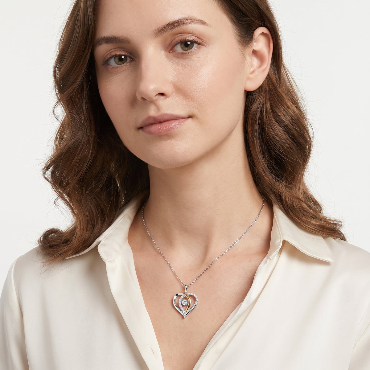 Woman wearing a 0.82 carat dancing moissanite heart pendant necklace