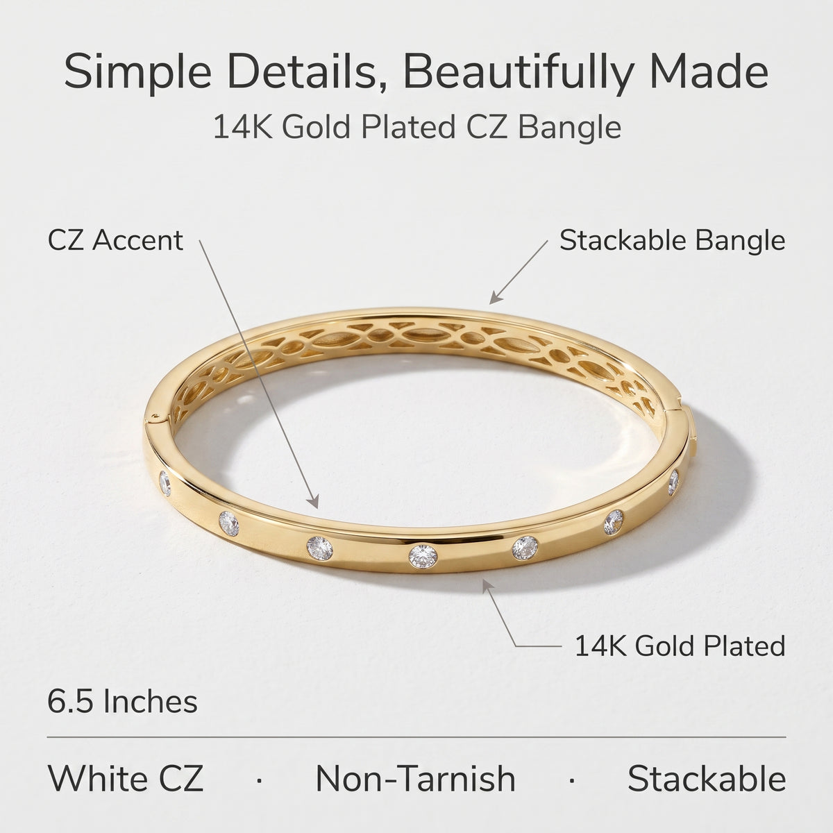 A gold-plated CZ bangle bracelet shown on a light gray background with text callouts reading 'CZ Accent,' 'Stackable Bangle,' '14K Gold Plated,' and '6.5 Inches,' plus a row of feature labels at the bottom.