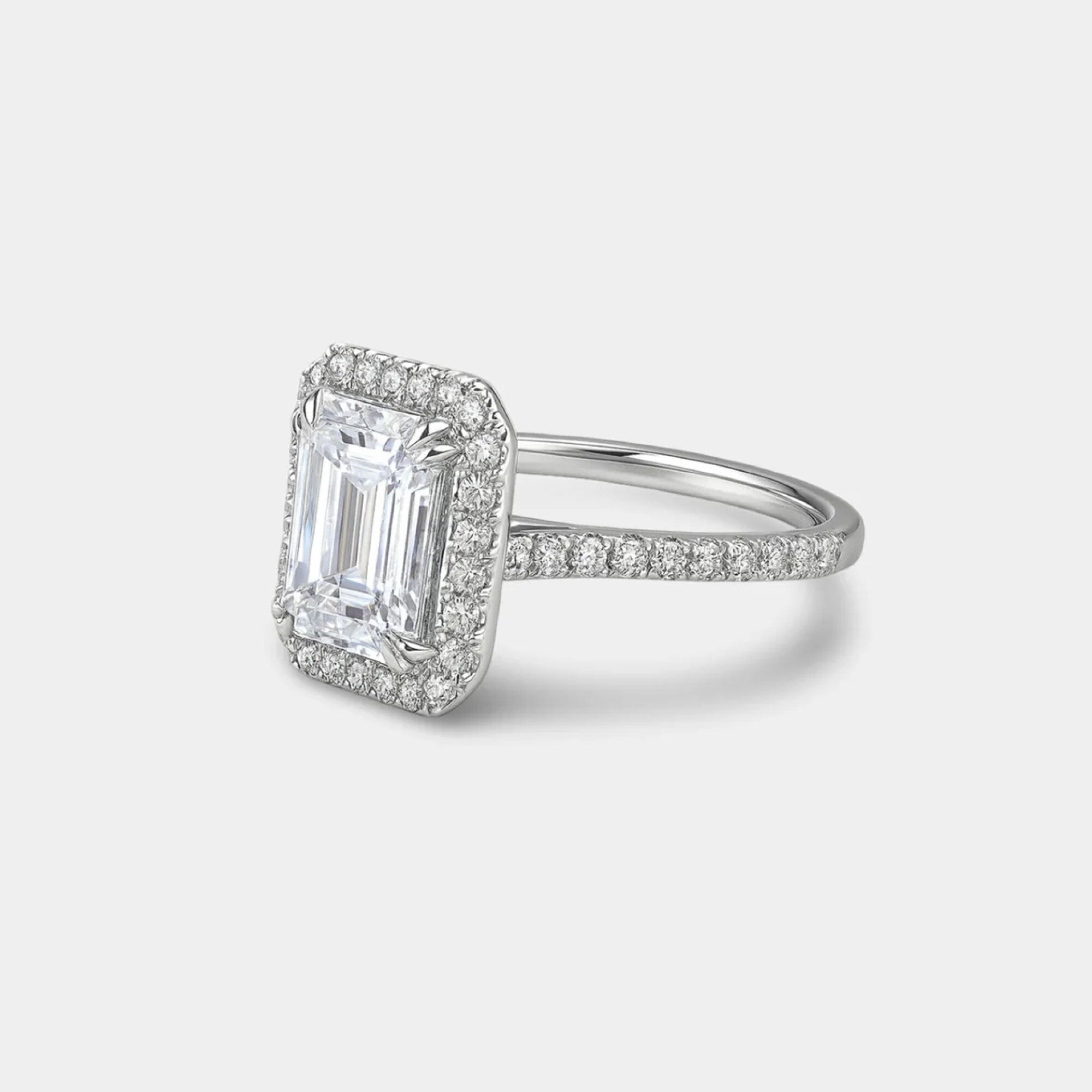 emerald cut moissanite halo engagement ring side angle view from MH Elegance luxury wedding rings collection