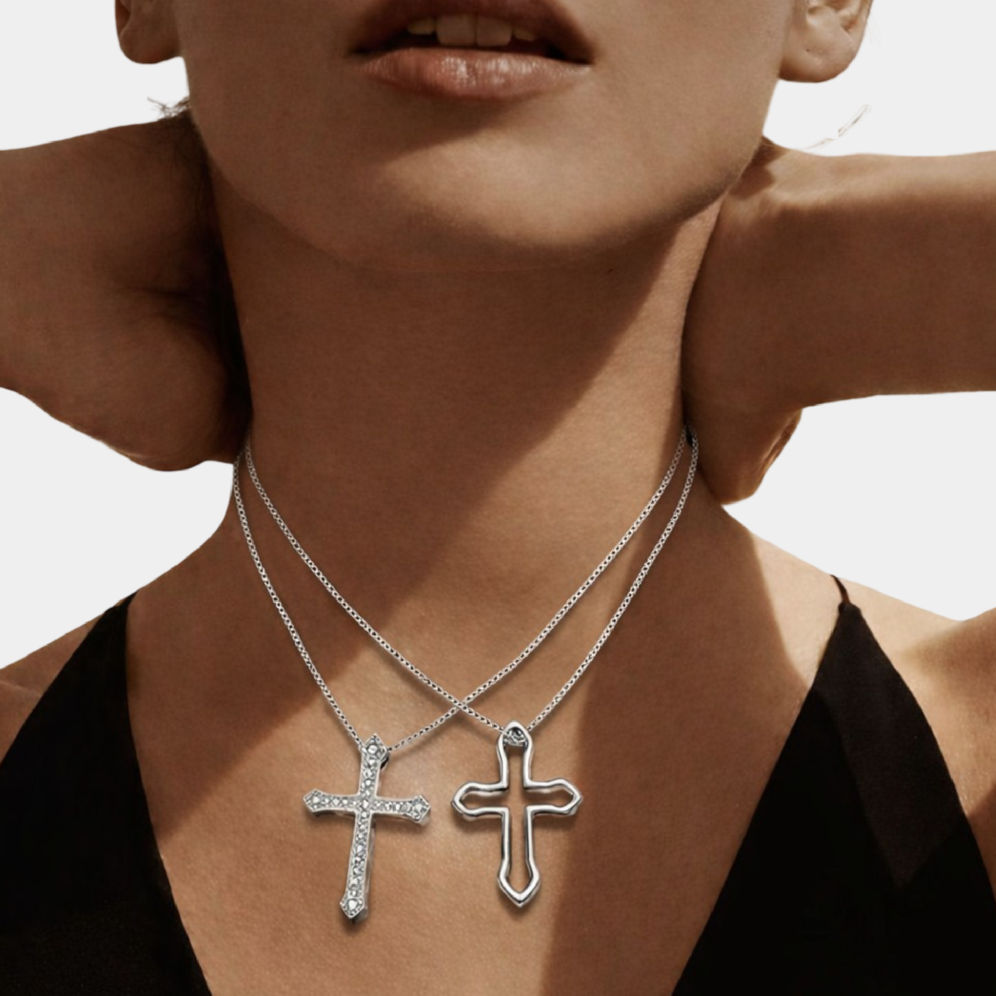 Couple wearing matching Eternal Bond sterling silver cross pendant necklaces lifestyle photo