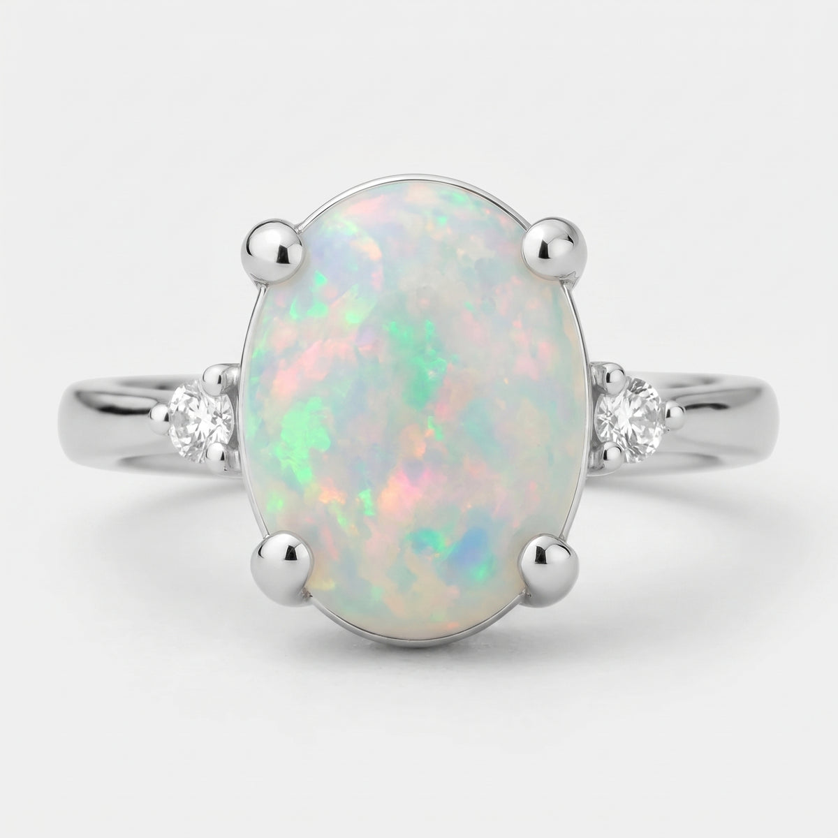 Bague 3 pierres en opale et diamants