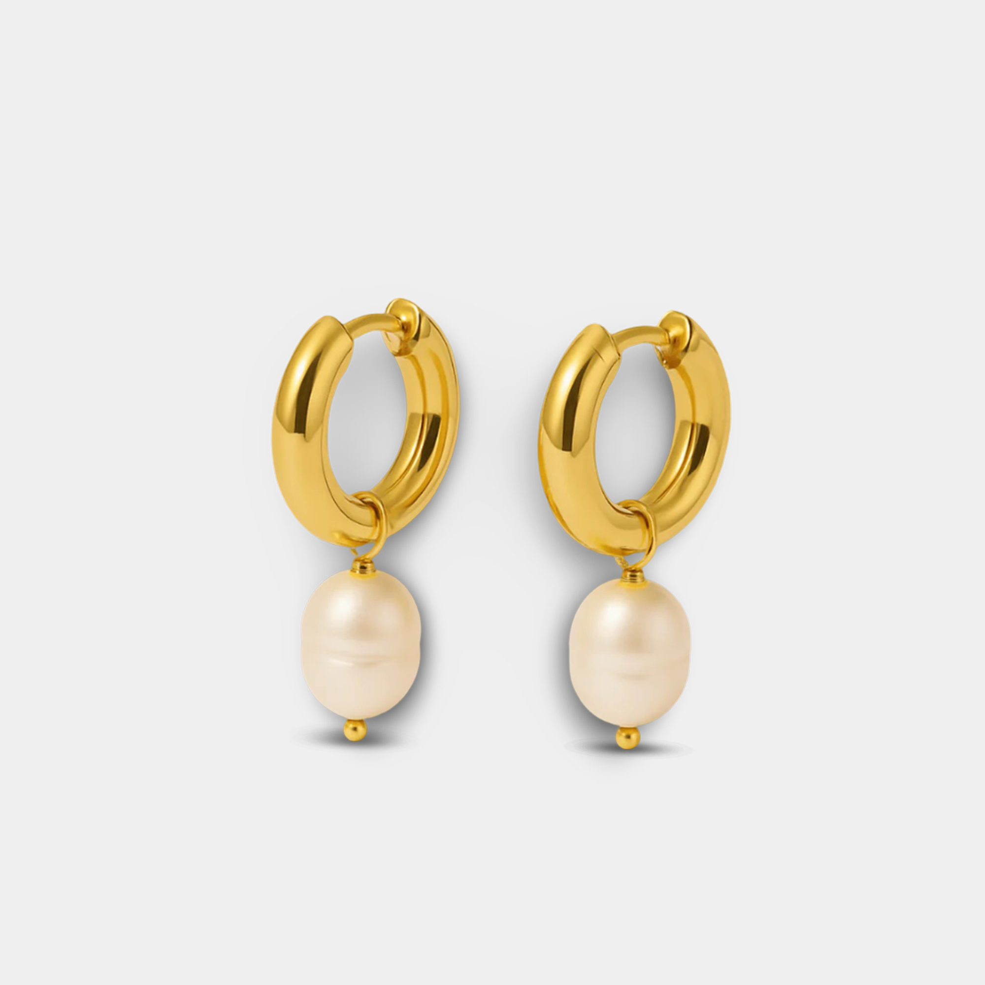 Aros con halo de oro y perla