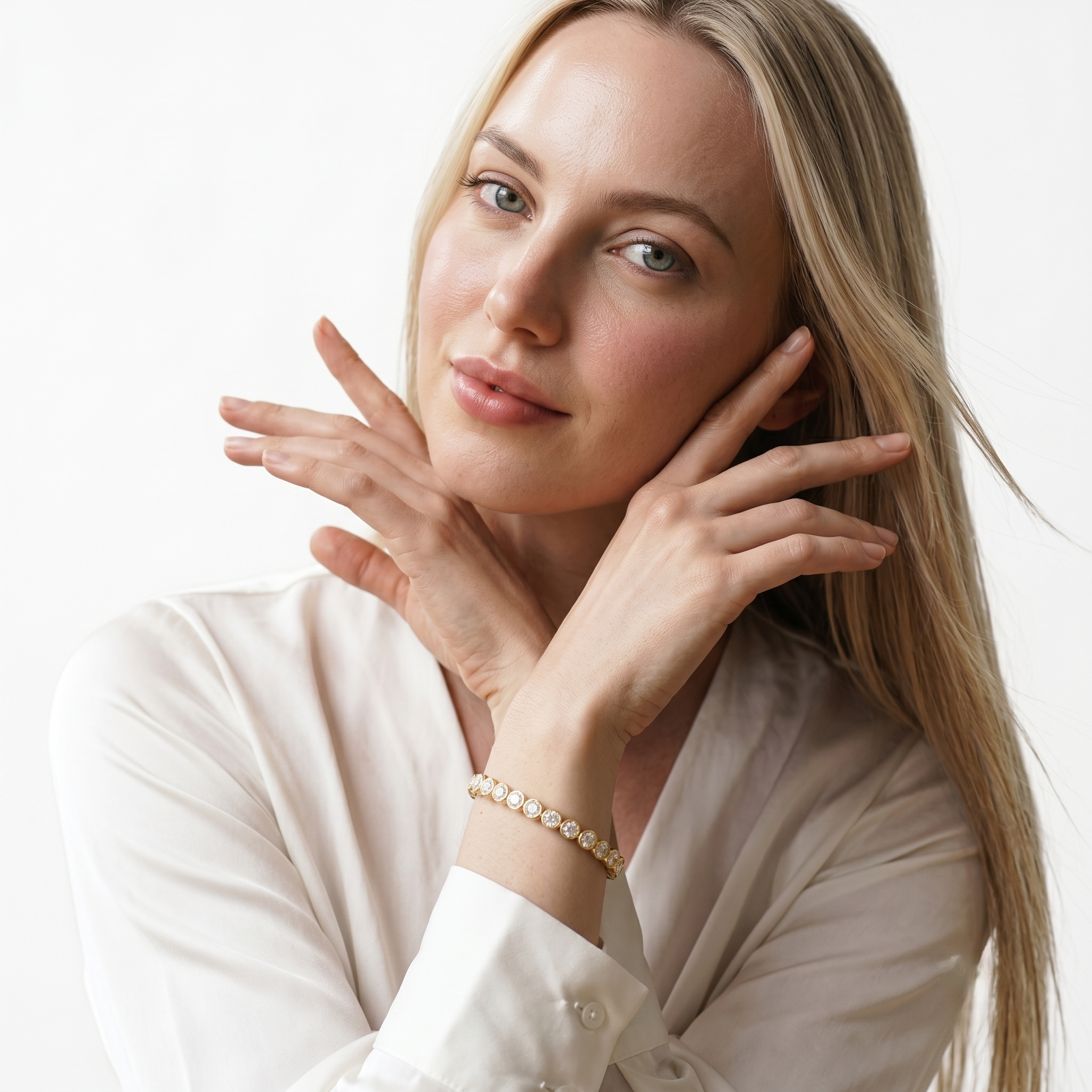 Close-up portrait of a woman wearing the 14K gold filled cubic zirconia bangle bracelet