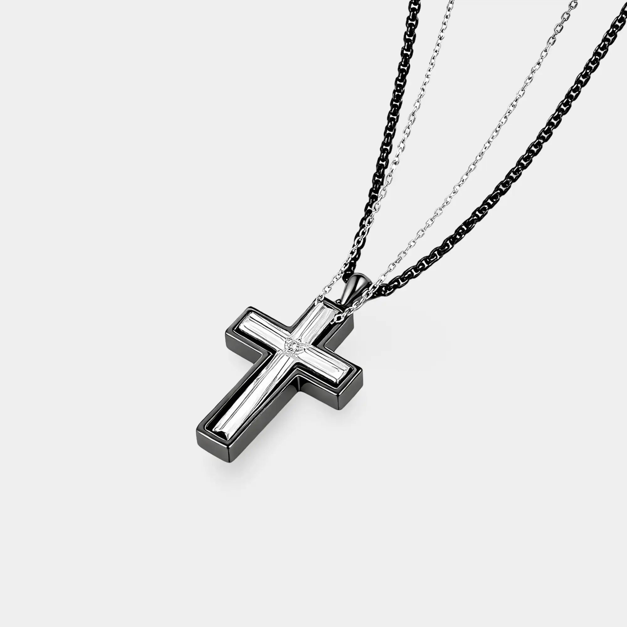 Couple wearing matching sterling silver faith cross pendant necklaces lifestyle shot.