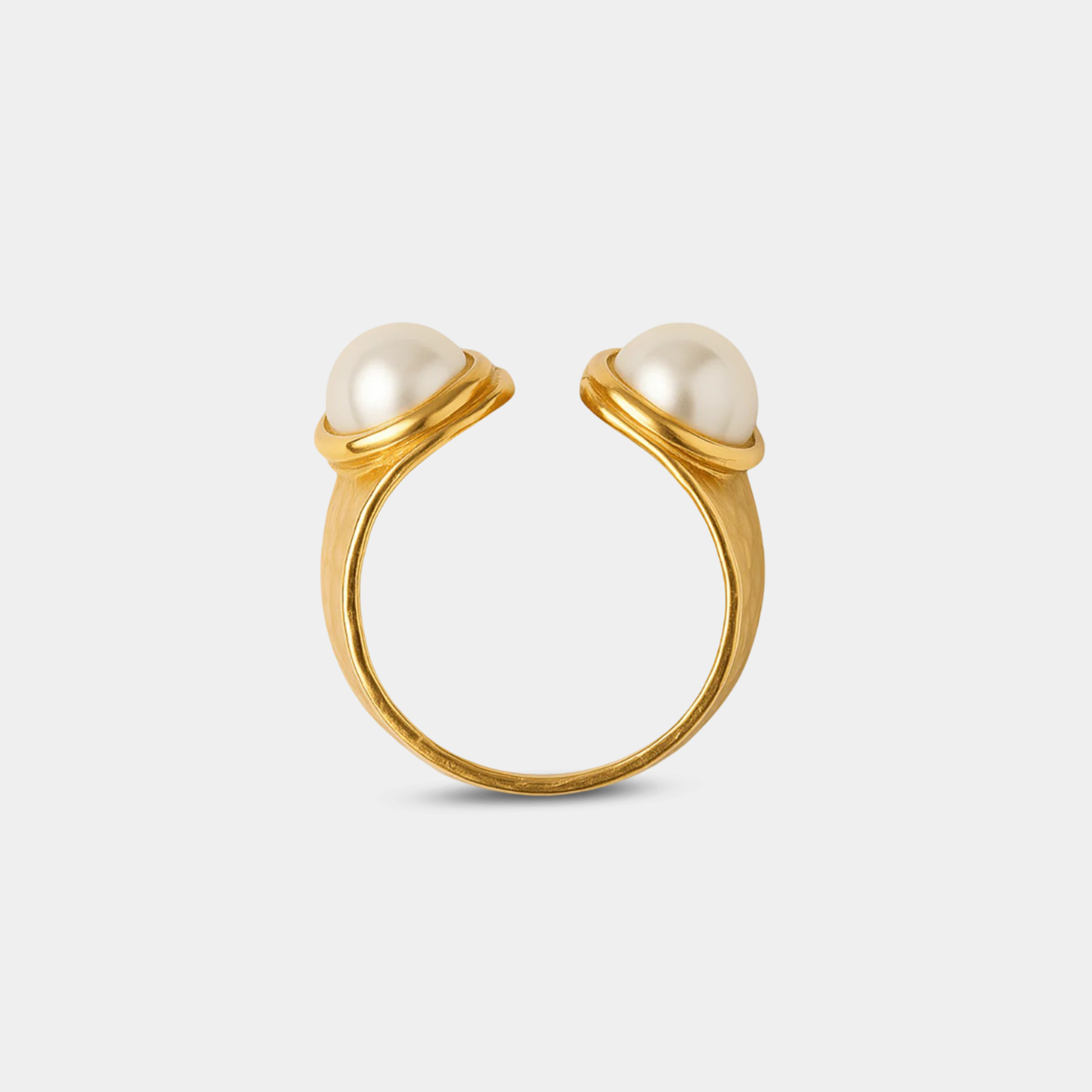 Anillo opulento de dos perlas