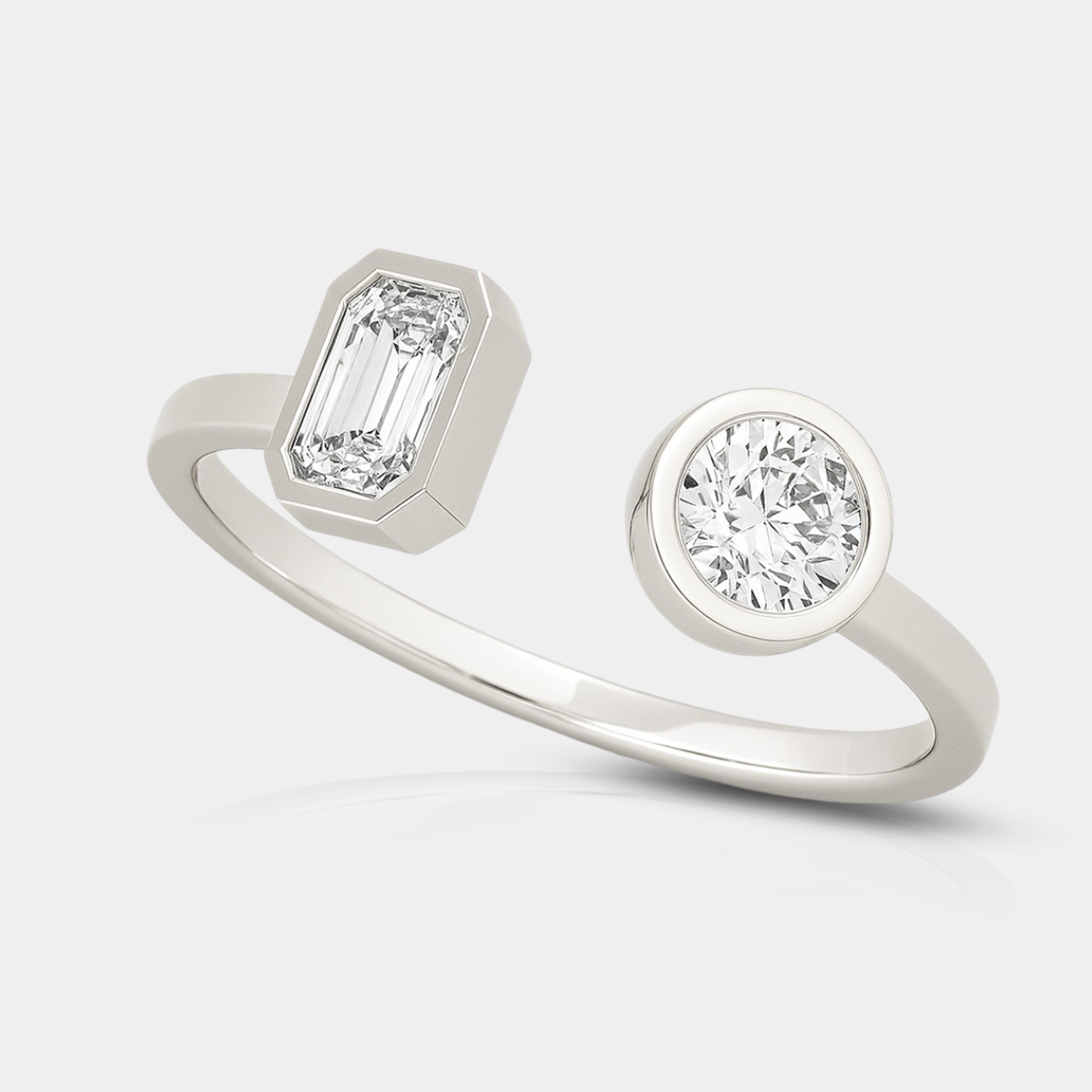 round and emerald diamond engagement ring gift packaging from MH Elegance luxury wedding rings collection