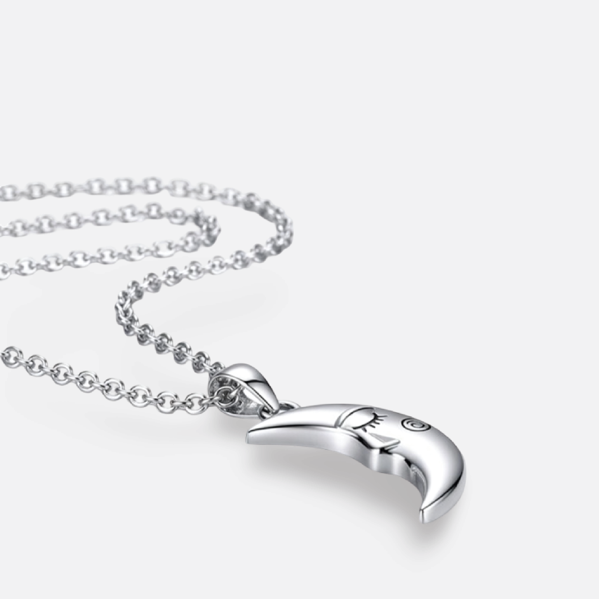 Couple wearing matching sterling silver sun and moon his and hers necklace set lifestyle photo
