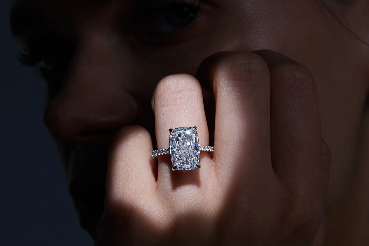 Diamond ring held close — the artistry behind MH Elegance fine jewelry and the careers that make it possible