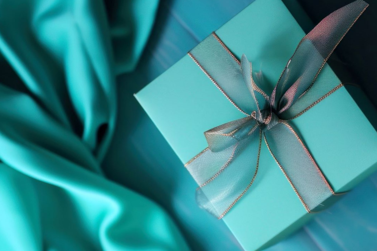 Luxury jewelry gift box on silk — the MH Elegance unboxing experience your work helps create for every customer