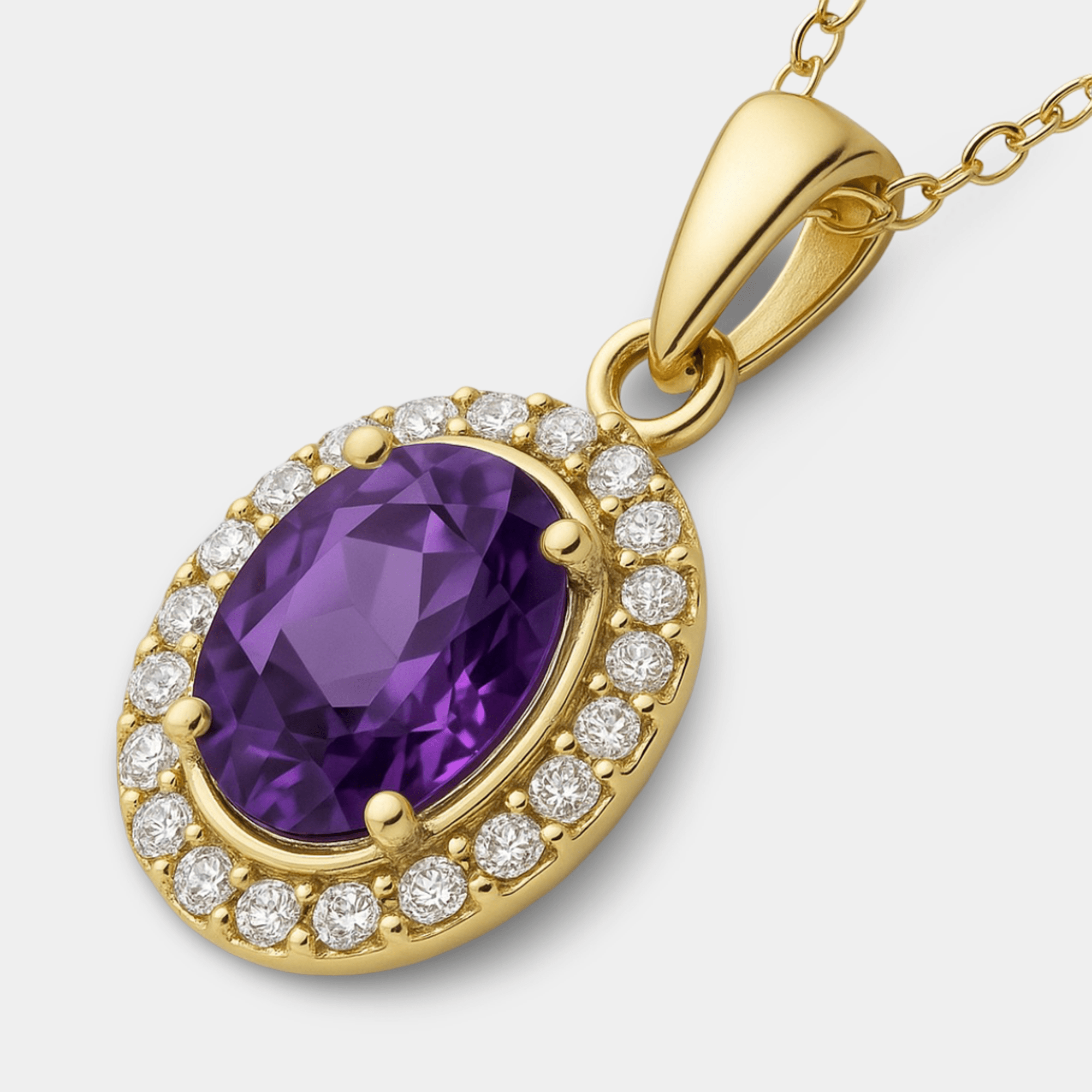 Close-up of the oval purple amethyst framed by a halo of small cubic zirconia stones in yellow gold