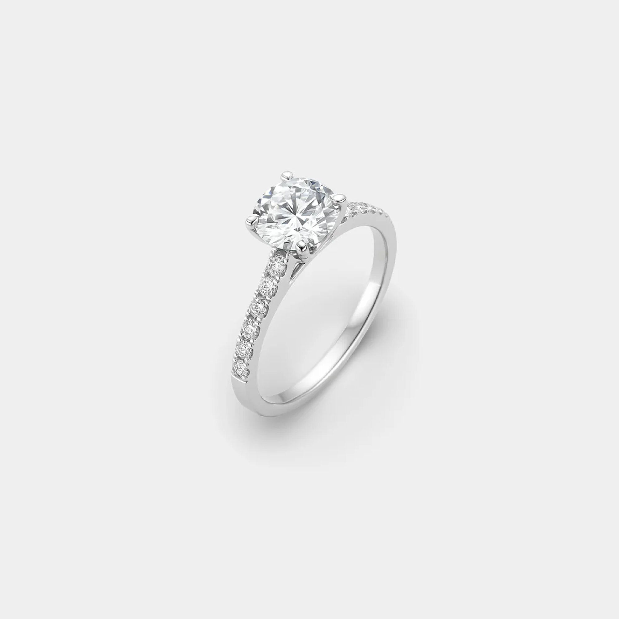 Basket Cathedral Moissanite Engagement Ring | Cathedral Setting - MH ELEGANCE - Close-up of cathedral arch shoulders and basket prong setting on moissanite engagement ring in 14K gold -