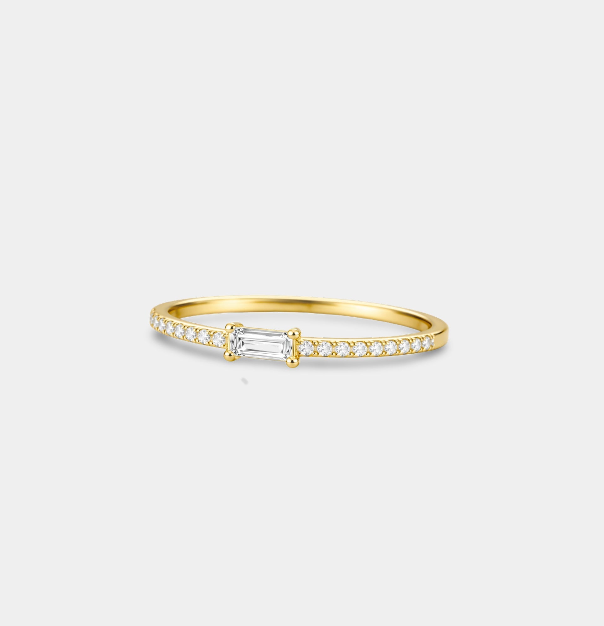 Side view of the thin gold baguette eternity band