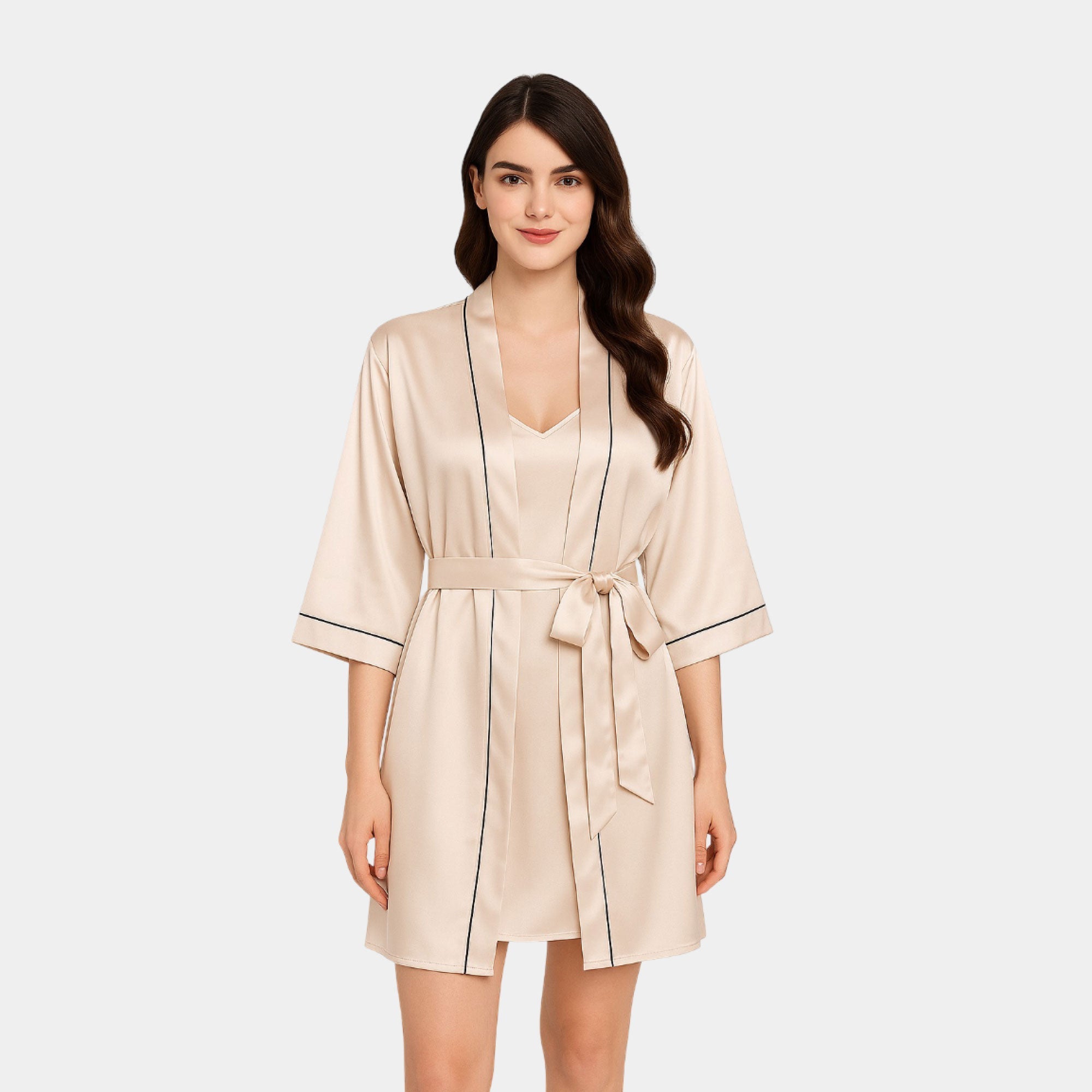 Champagne Silk Robe Set - MH ELEGANCE - Woman wearing a beige robe with black trim on a white background -