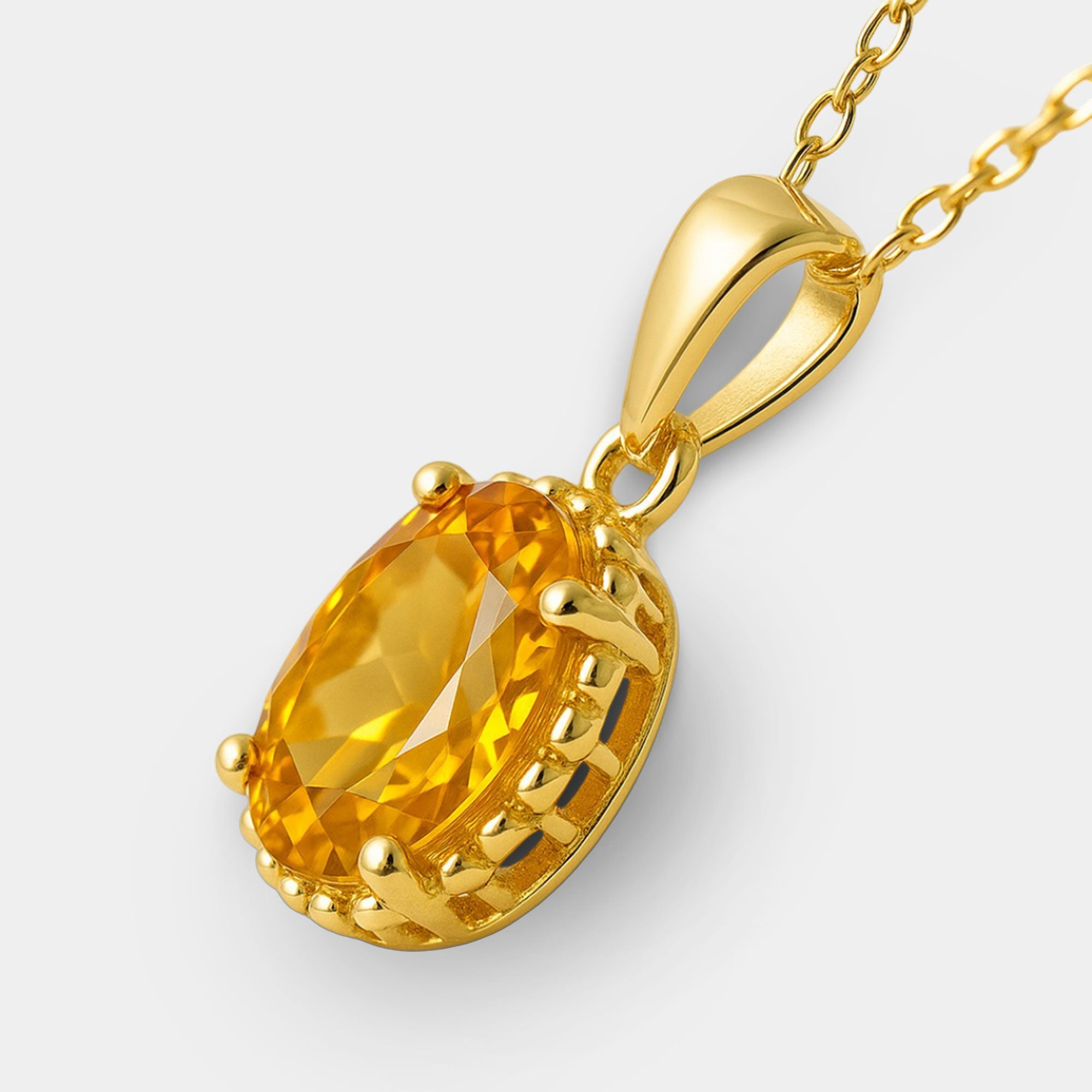 Citrine pendant shown with its gold-plated 18 inch cable chain and spring ring clasp.