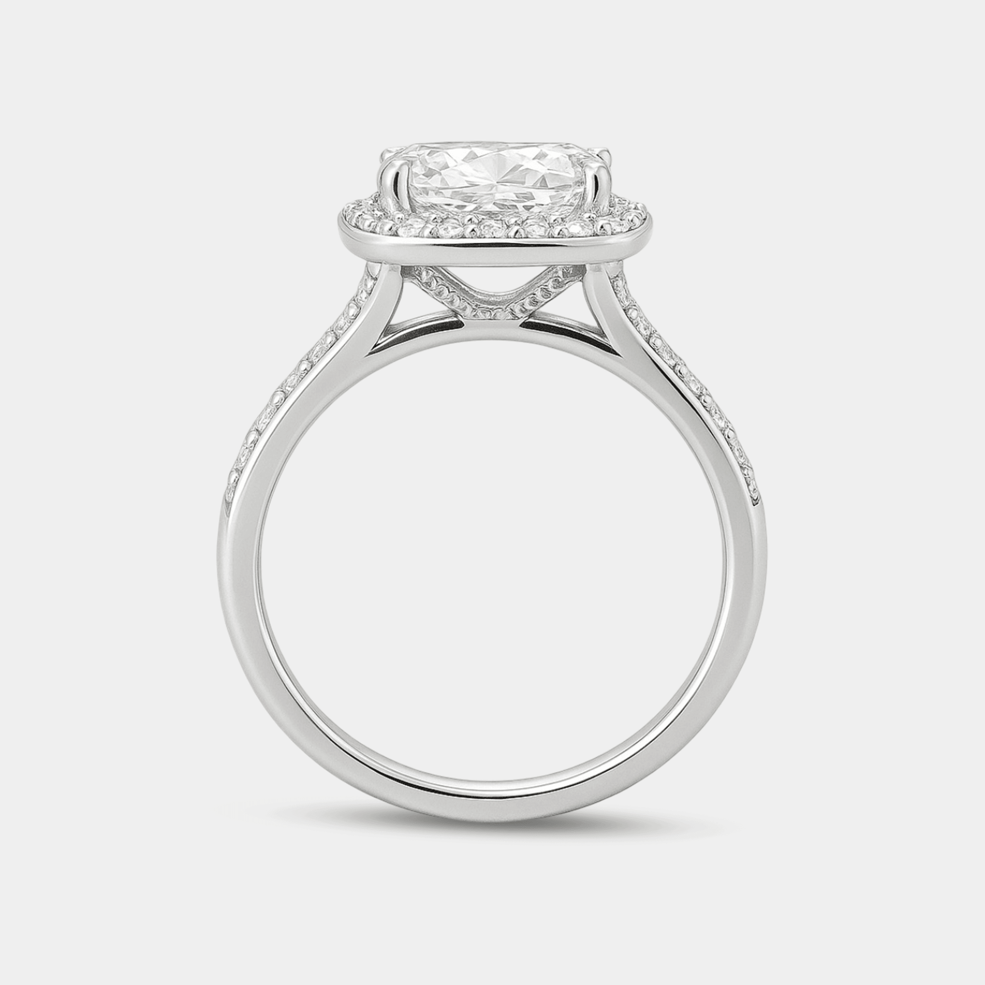 Side angle view of the cushion moissanite halo ring in sterling silver