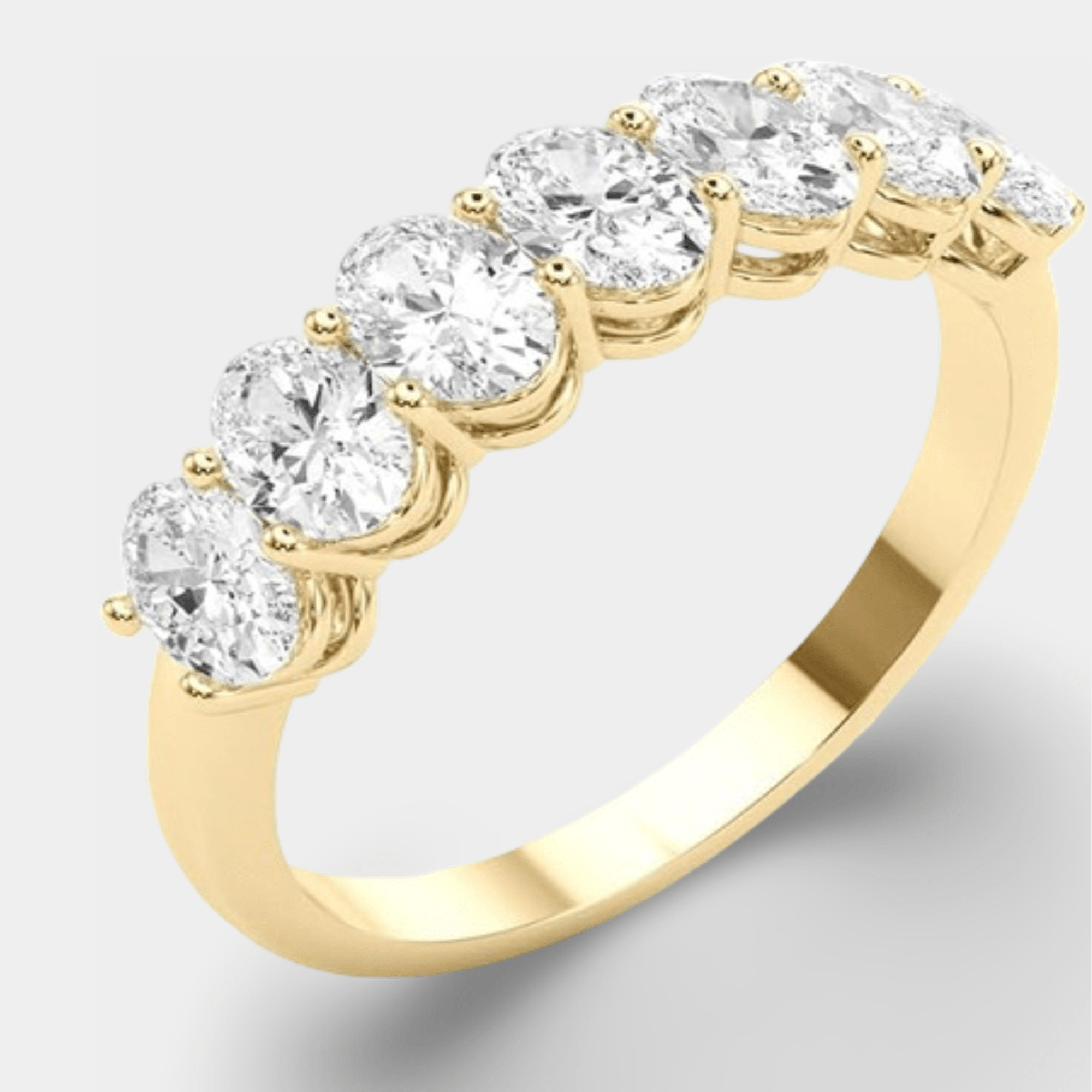 Diamond Seven Stone Anniversary Band | 14K Yellow Gold / White Gold - MH ELEGANCE - diamond seven stone anniversary band side angle view from MH Elegance luxury wedding rings collection - Ring