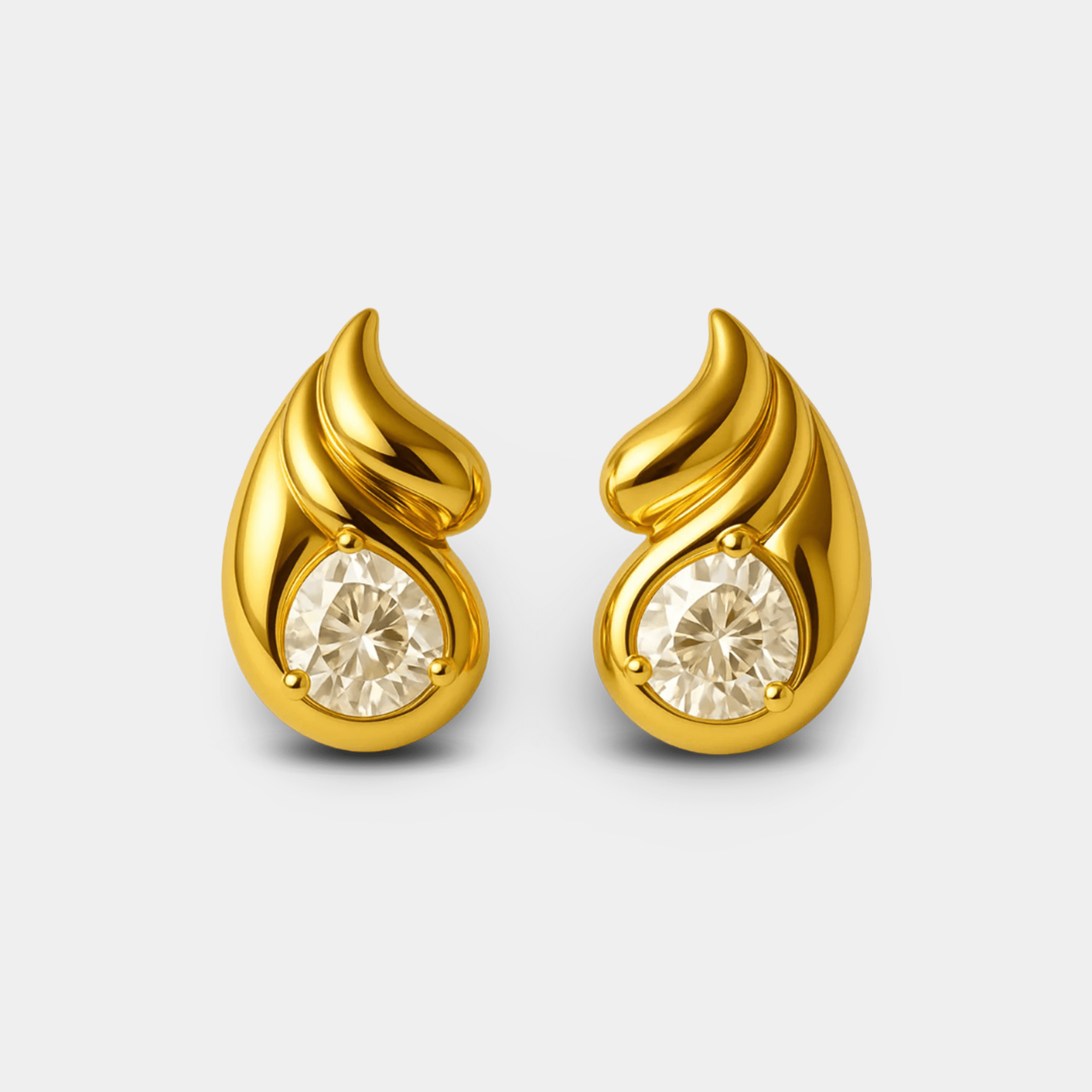 Double teardrop stud earrings in gold-plated finish with cubic zirconia from MH Elegance.