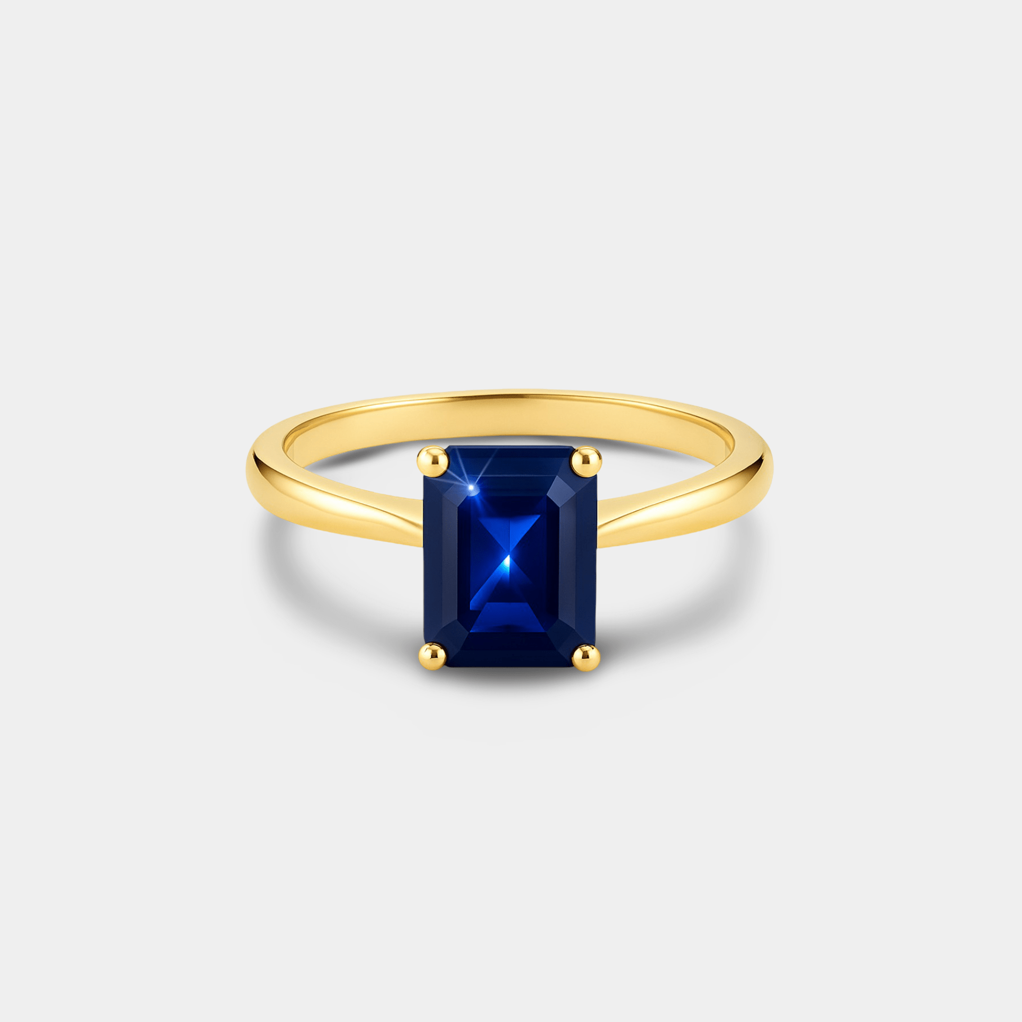 Emerald-Cut Blue Sapphire Solitaire Ring - MH ELEGANCE - Emerald-Cut Blue Sapphire Solitaire Ring - MH ELEGANCE -