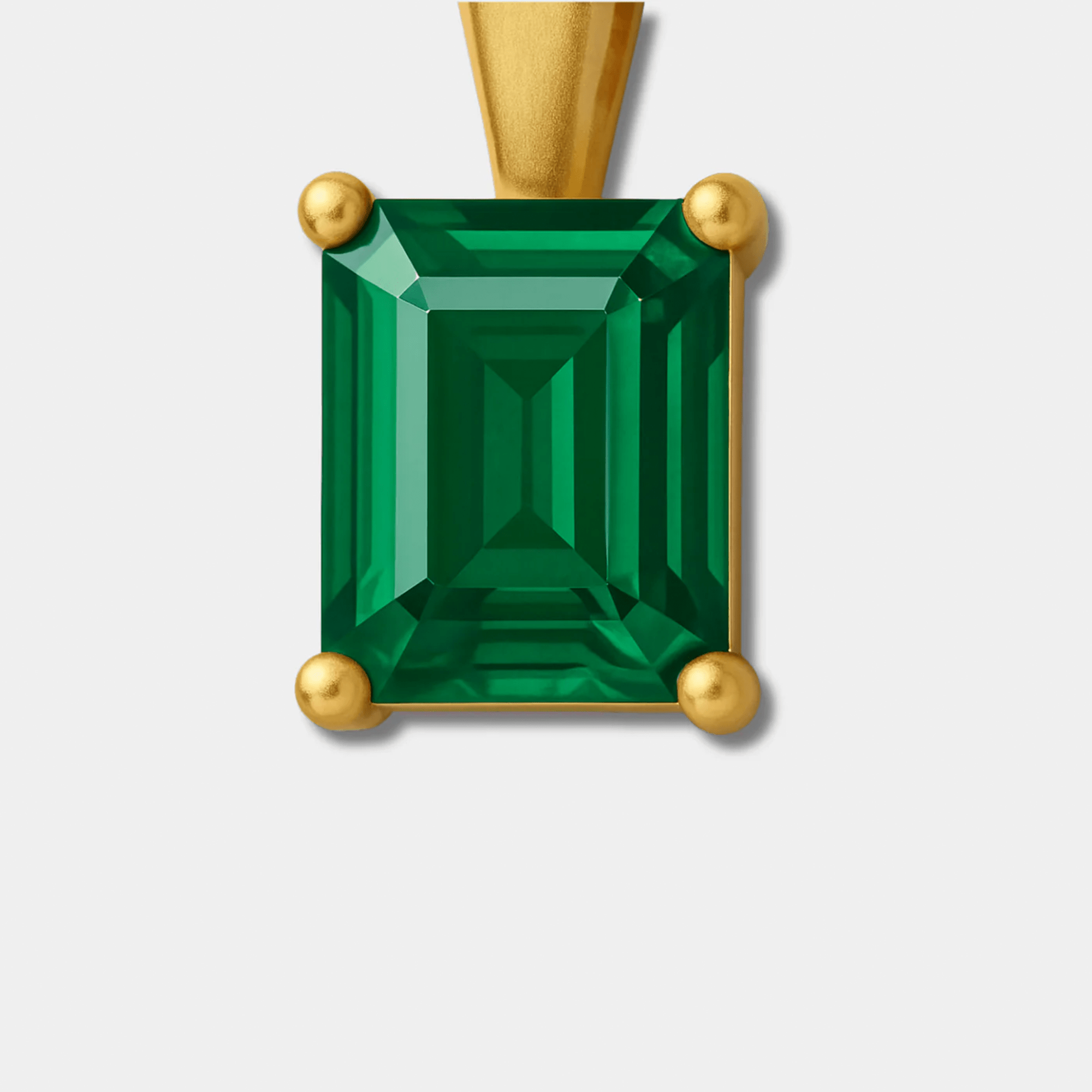 Close-up of the square green zircon stone in a gold-plated setting.