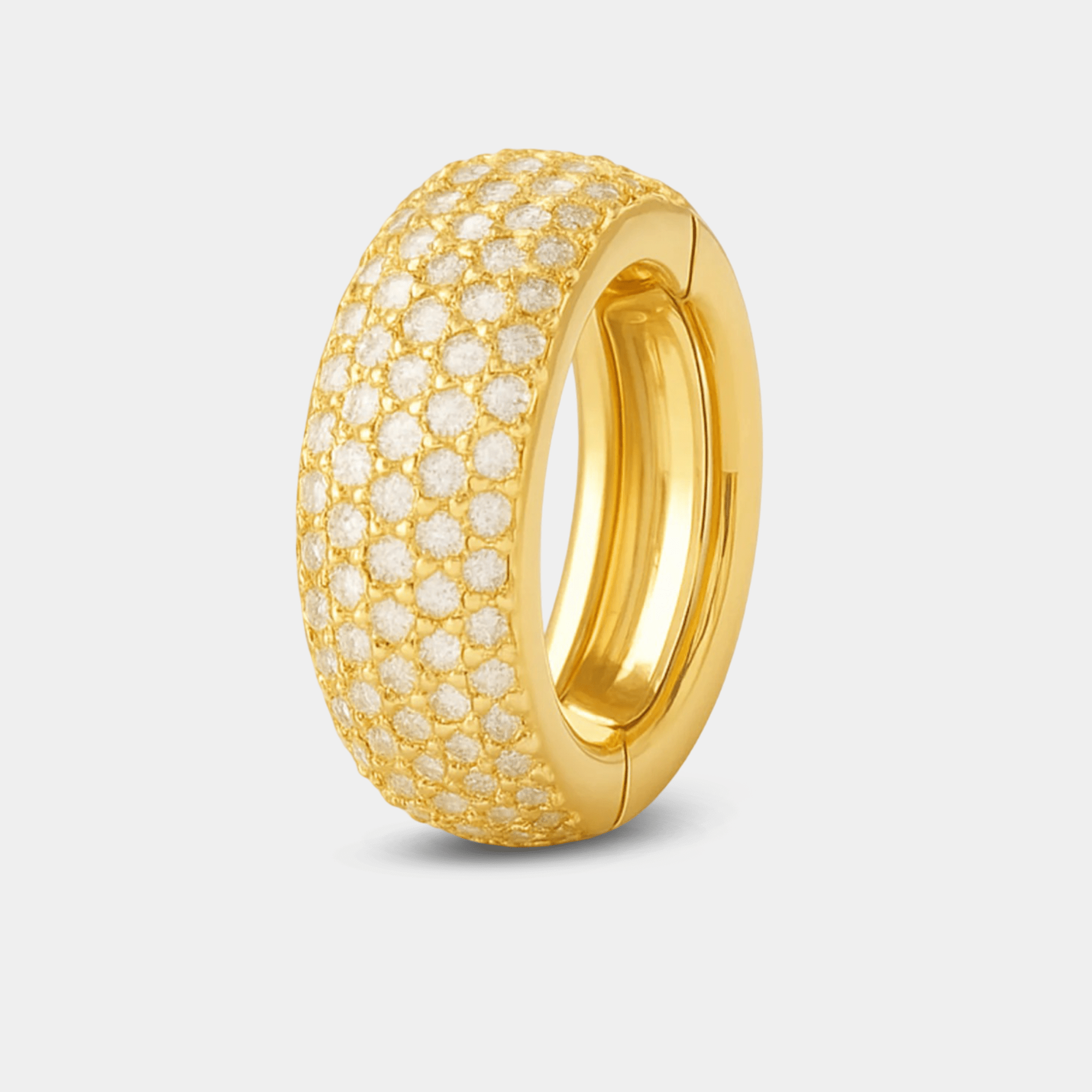Single GlamBrick gold hoop earring close-up with secure huggie hinge clasp and pavé crystals