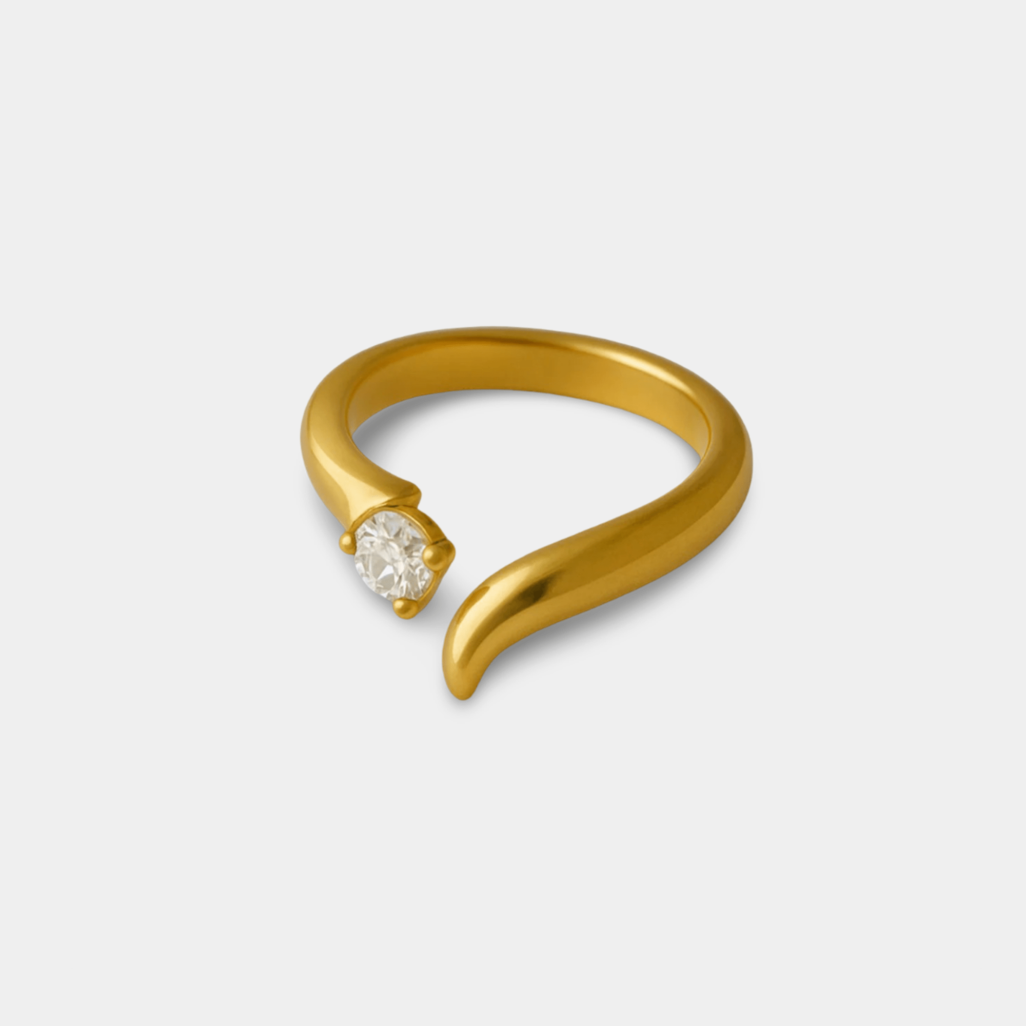 Close-up of gold curved rhinestone inlay ring – titanium steel with real gold PVD coating, waterproof and non-tarnish women's jewelry by MH Elegance