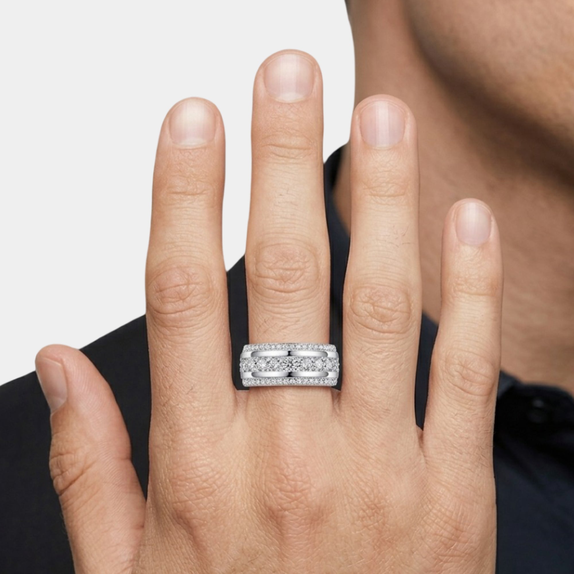 Close-up of the three rows of cubic zirconia on a white gold plated men's band
