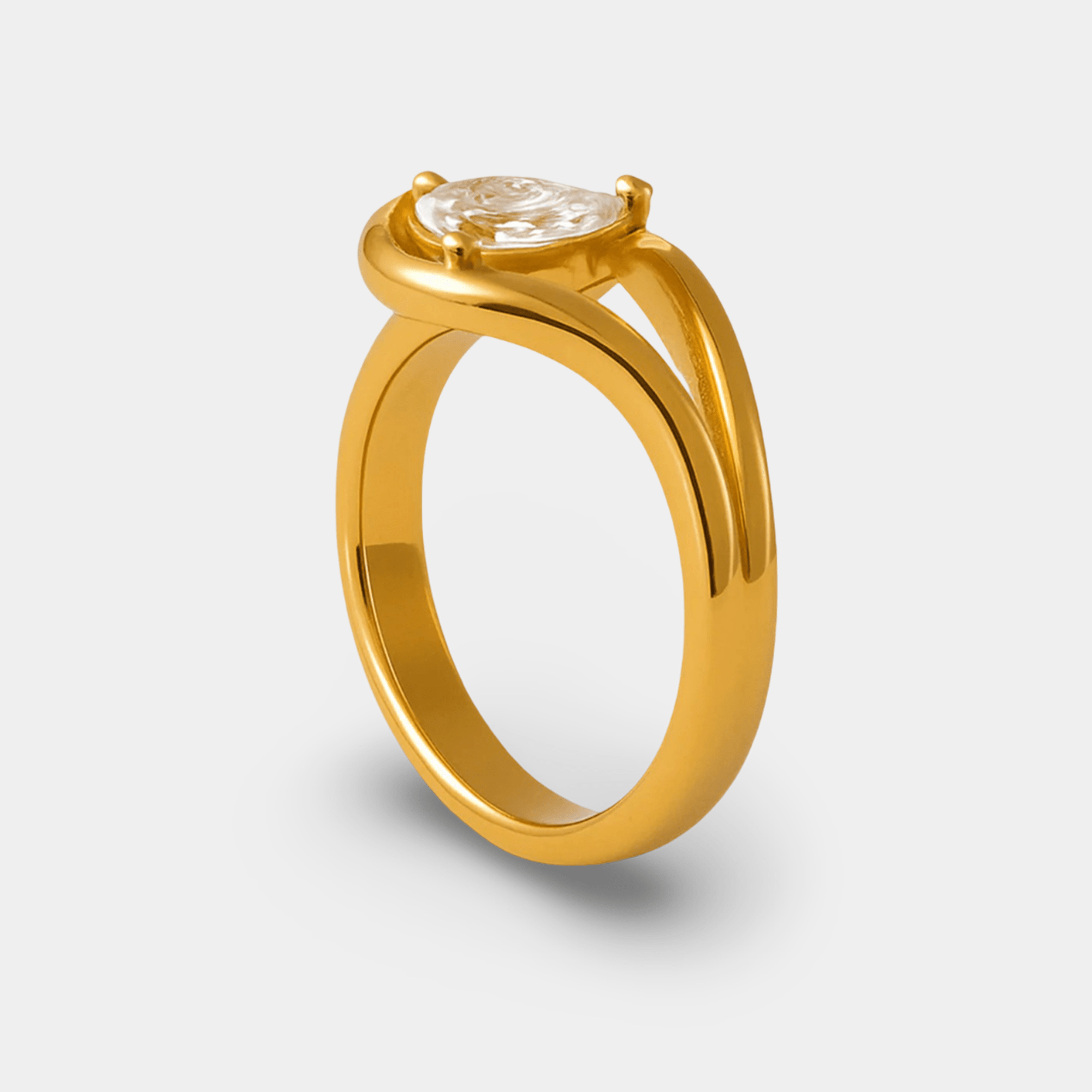 Adjustable gold twist ring worn on a woman's finger for an everyday statement look