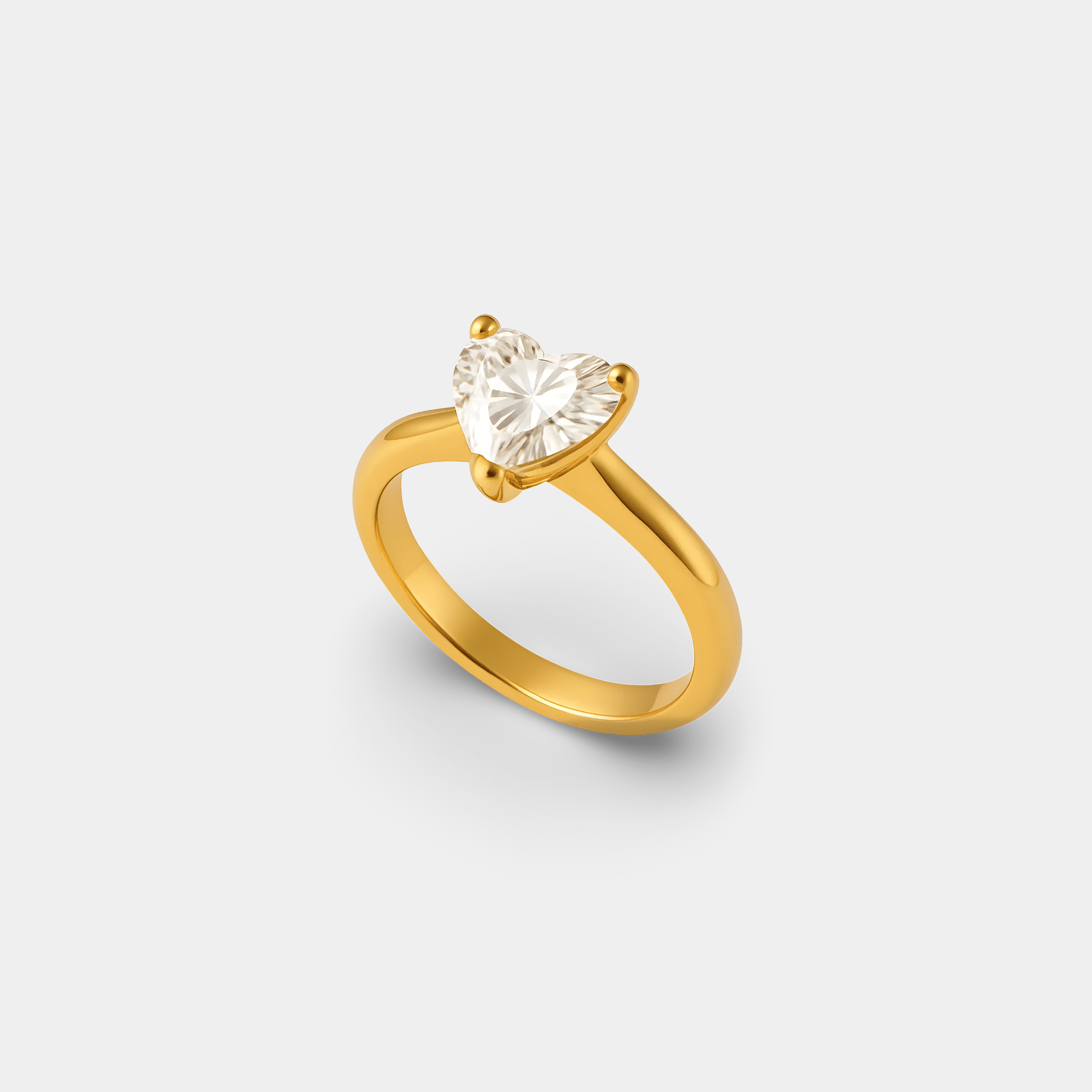 Top-down angled view of the heart shaped CZ cocktail ring in 14K gold plated finish