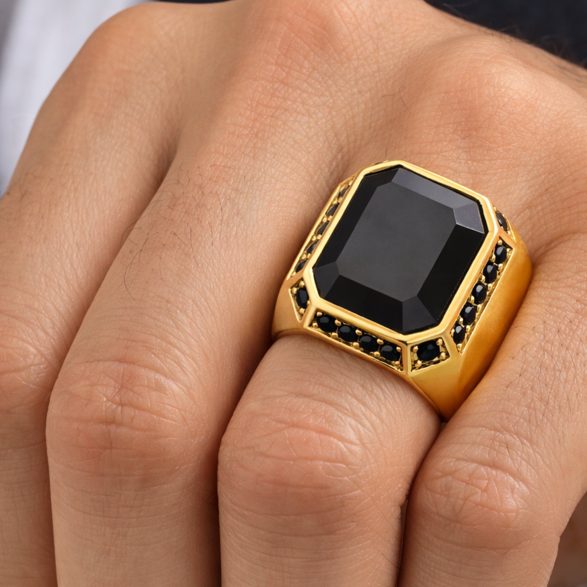 Black onyx gold signet ring for men, top view of the full ring