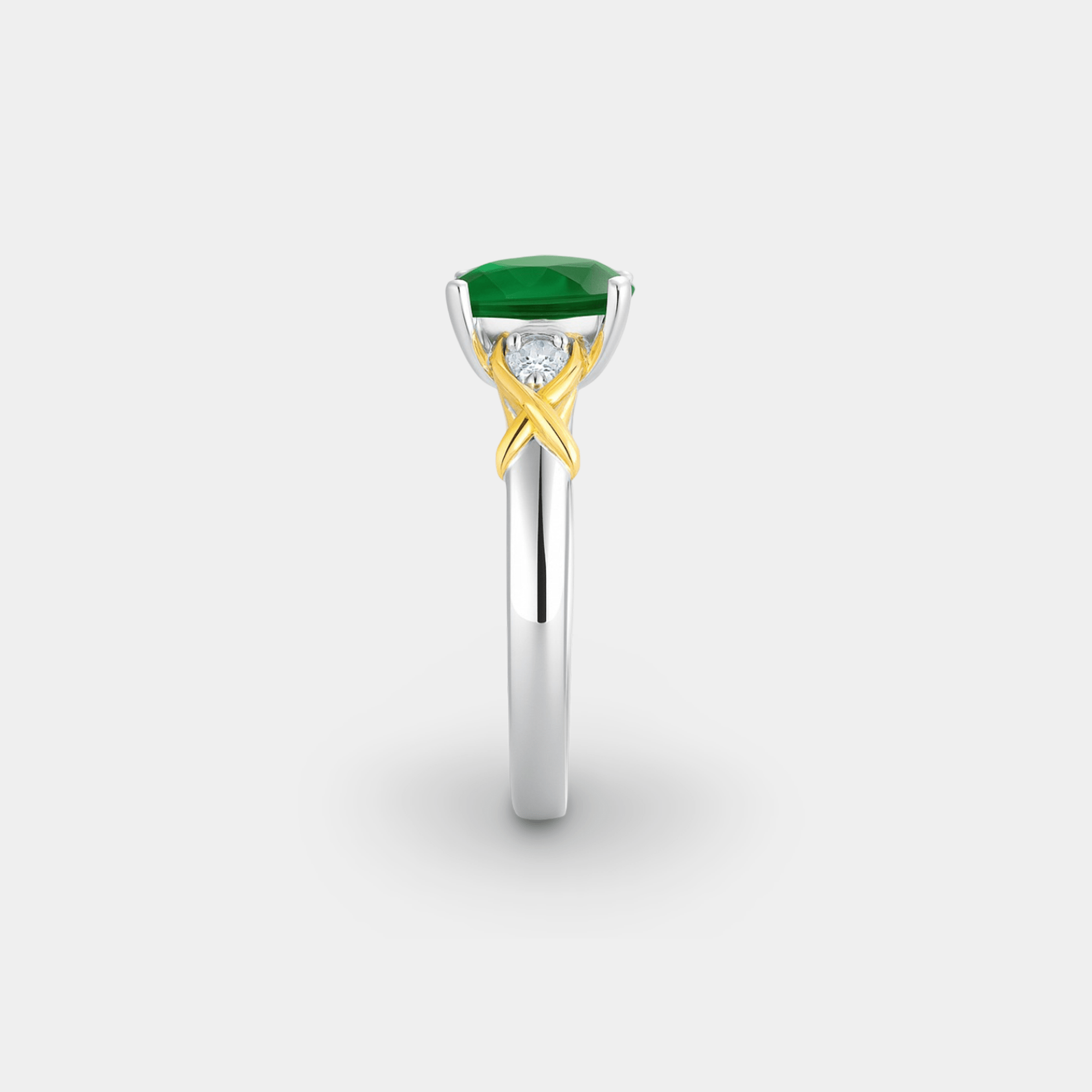 Two-tone gold and sterling silver nano emerald engagement ring, top-down detail view