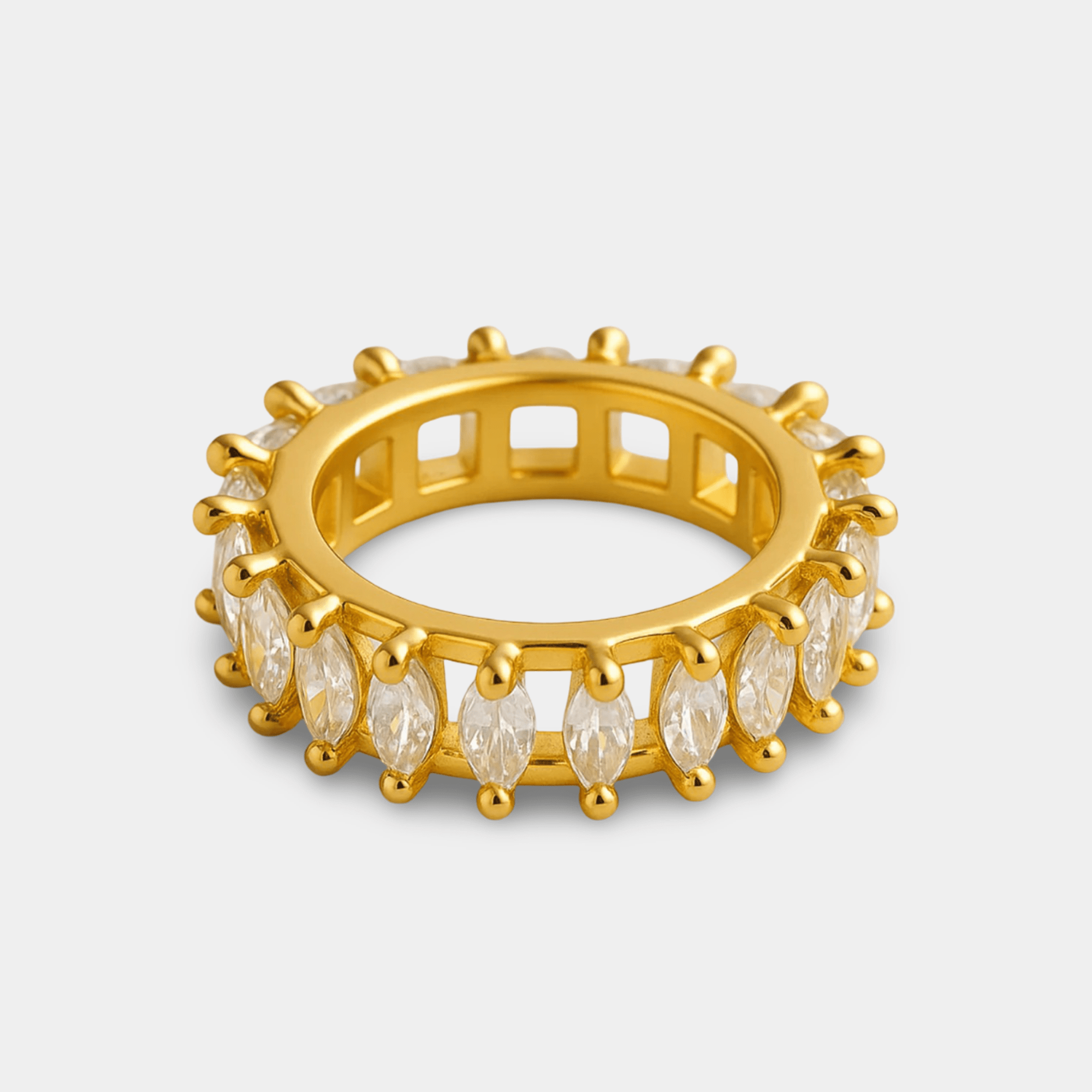 Flat lay of marquise cut zircon ring showing full geometric design on a real gold PVD stainless steel band