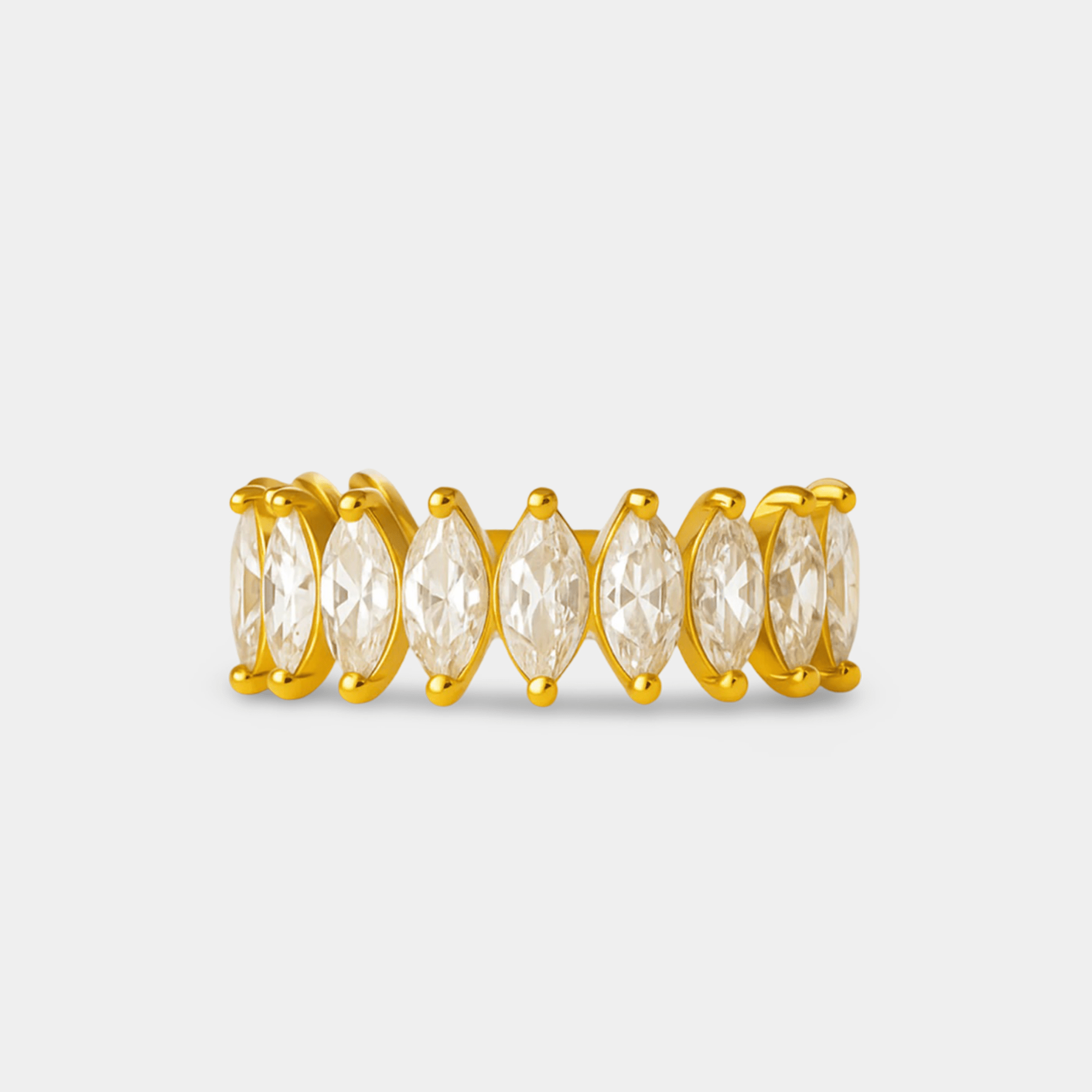Close-up of marquise cut zircon geometric inlay on gold PVD 304 stainless steel ring showing brilliant facets
