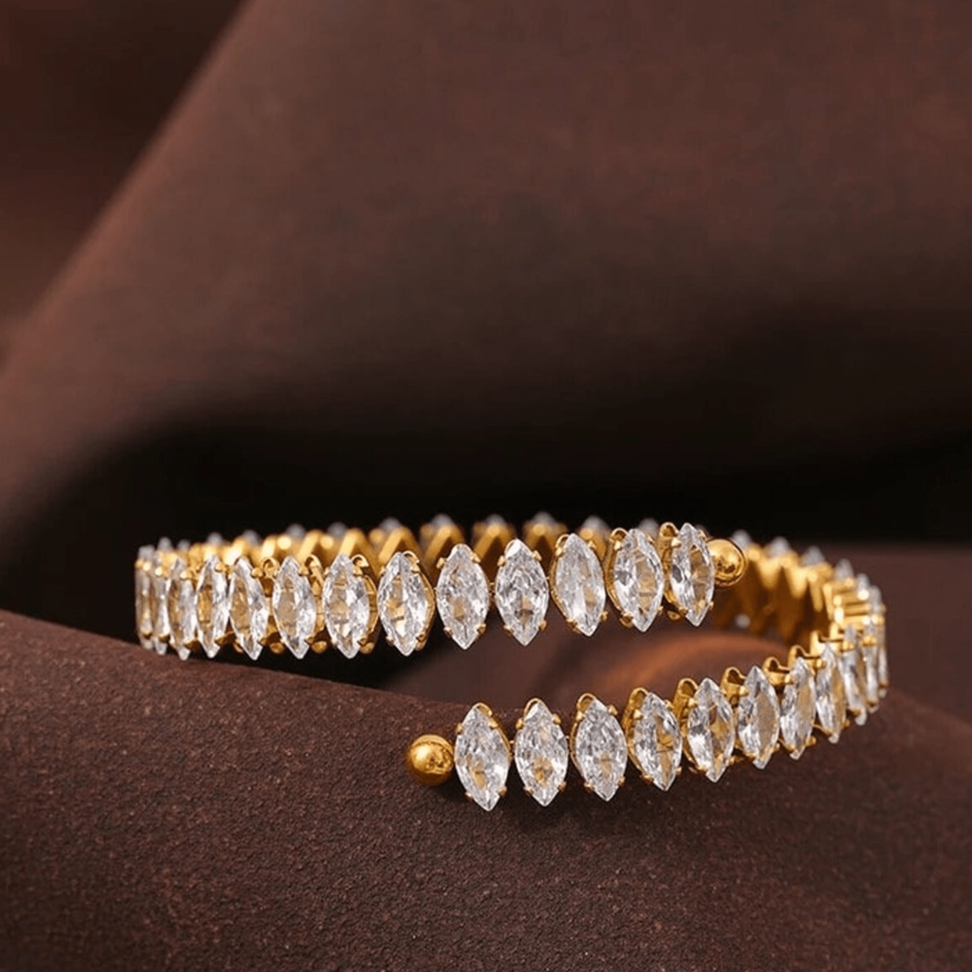 Sparkling marquise zircon inlay detail on women's 18K gold PVD bangle – MH Elegance