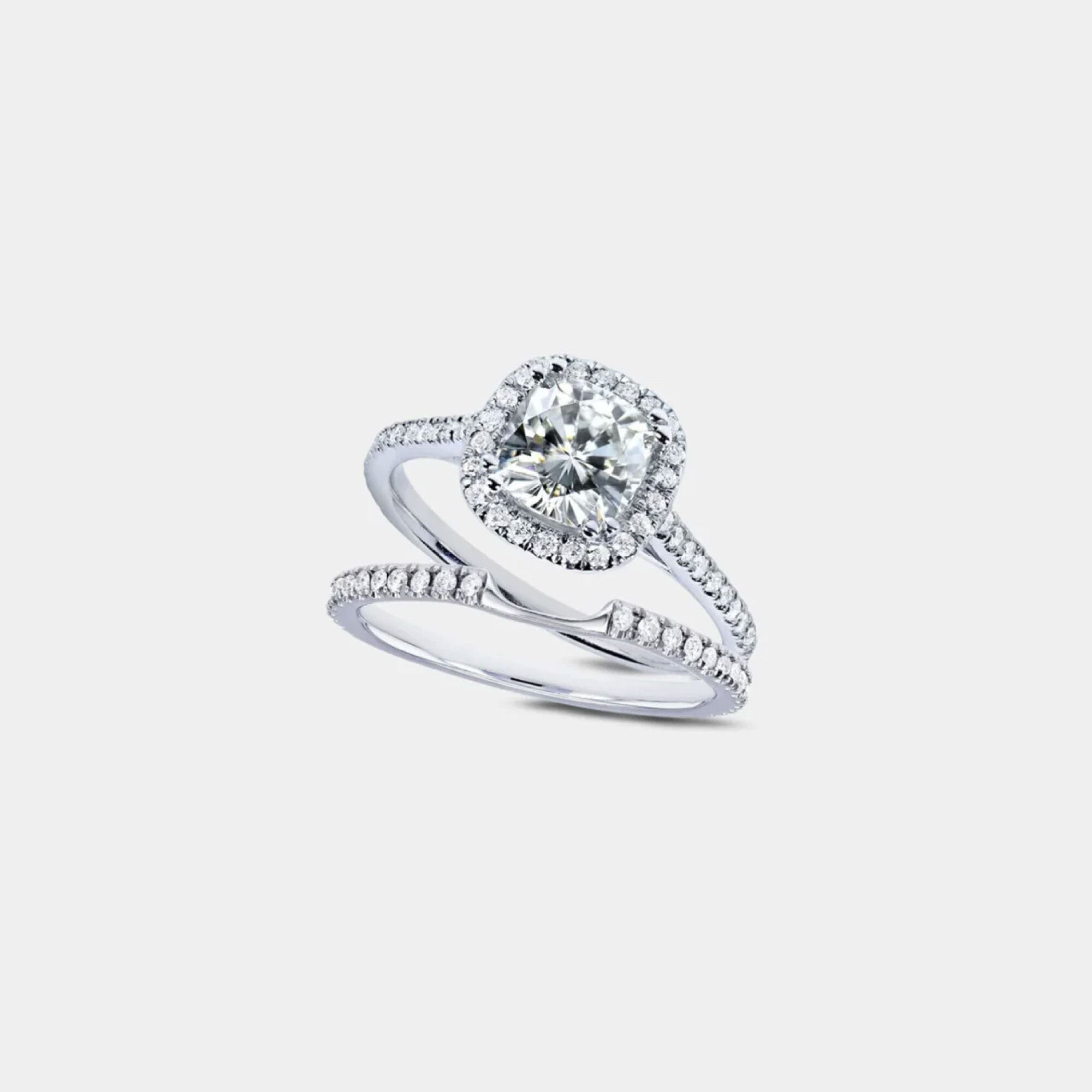 Moissanite & Diamond Halo Bridal Ring Set | Complete Bridal Set | 14K Gold - MH ELEGANCE - Moissanite and diamond halo bridal ring set worn on a woman's hand showing complete bridal look in 14K gold- MH ELEGANCE -