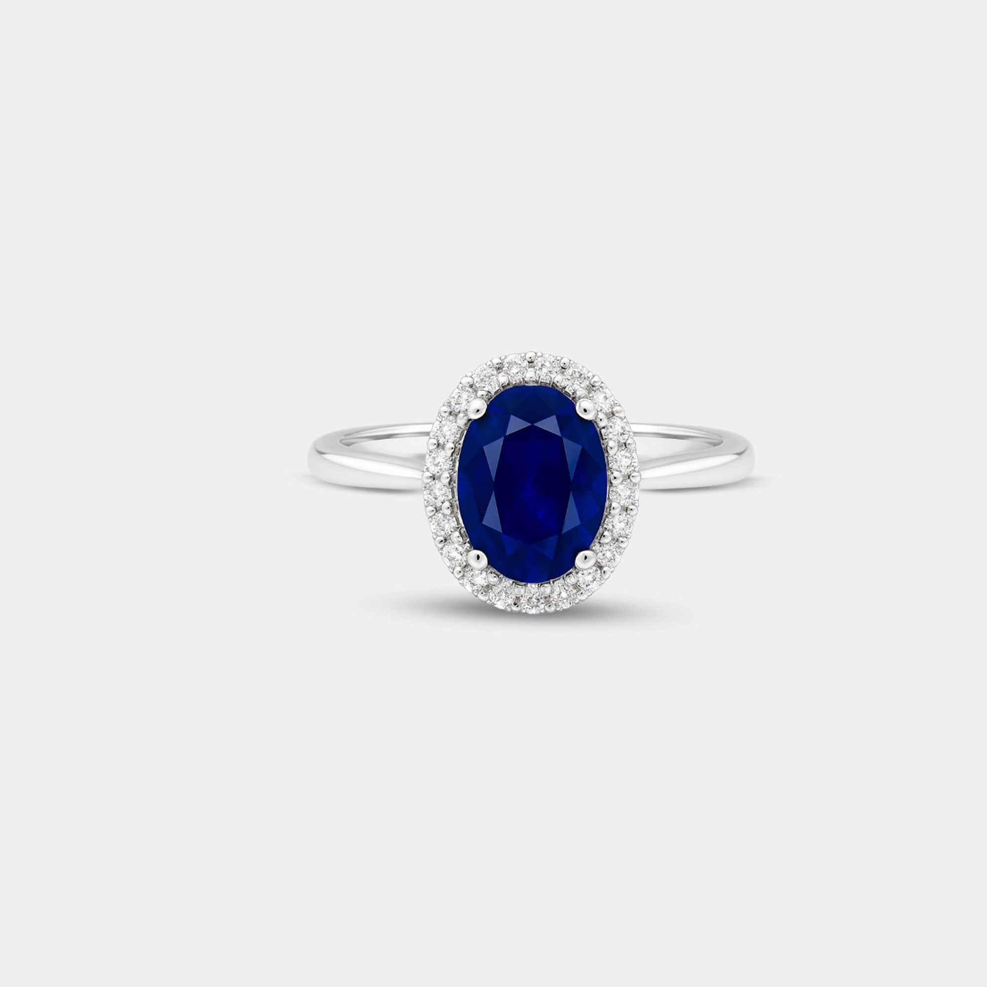Oval Blue Sapphire & Diamond Halo Ring - MH ELEGANCE - Oval Blue Sapphire & Diamond Halo Ring - MH ELEGANCE -