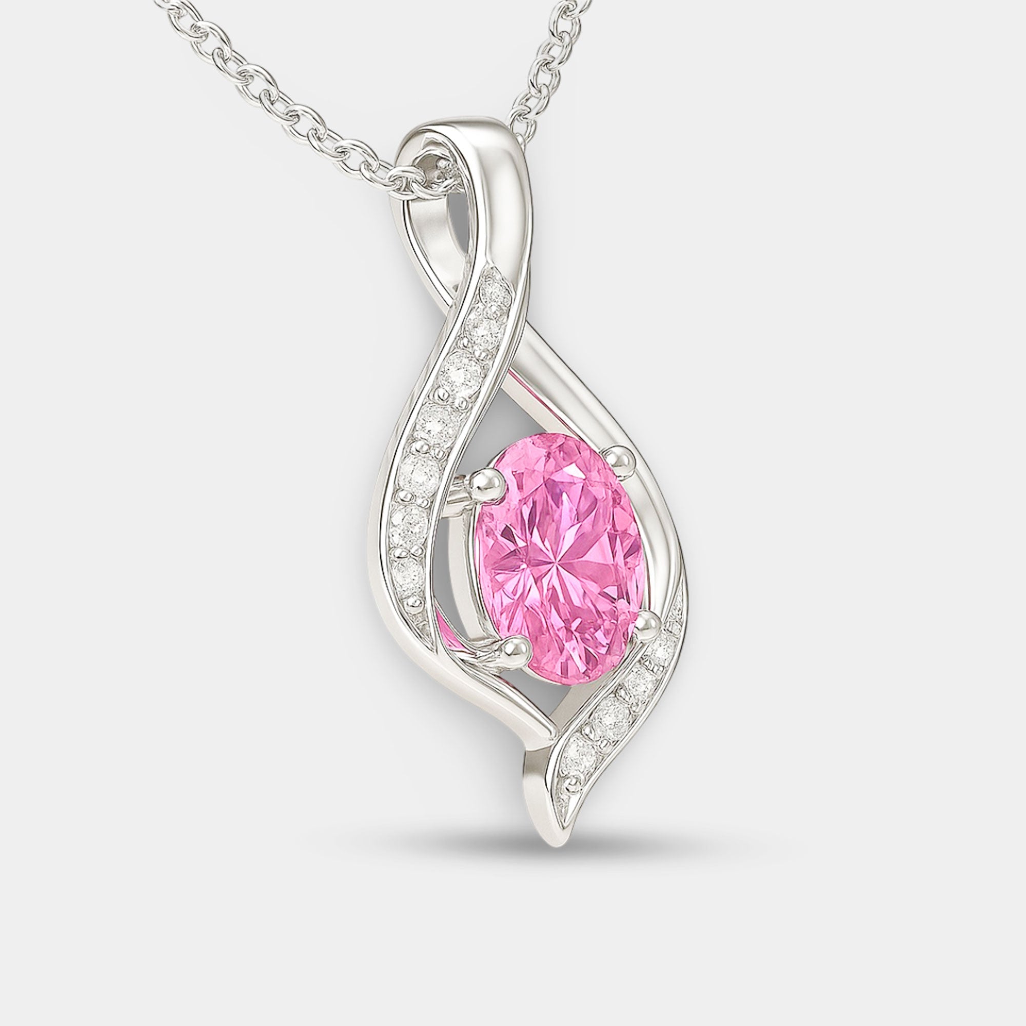 Pink tourmaline pendant shown with its sterling silver cable chain and lobster clasp.