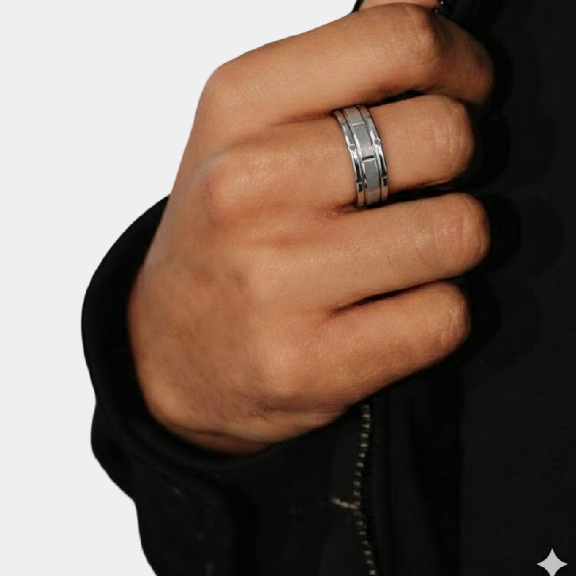 Matching couples wedding rings, sterling silver and steel bands paired side by side