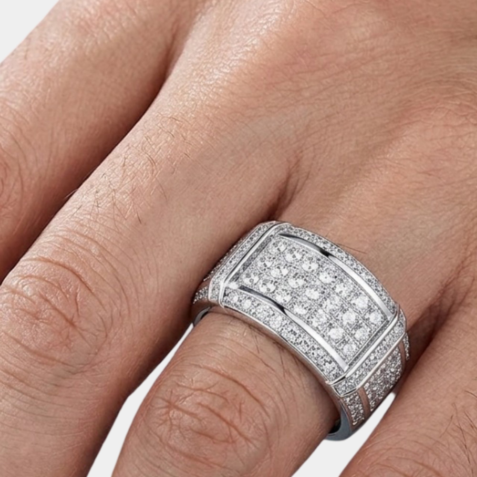 Close-up of the round cubic zirconia stones on a men's silver band