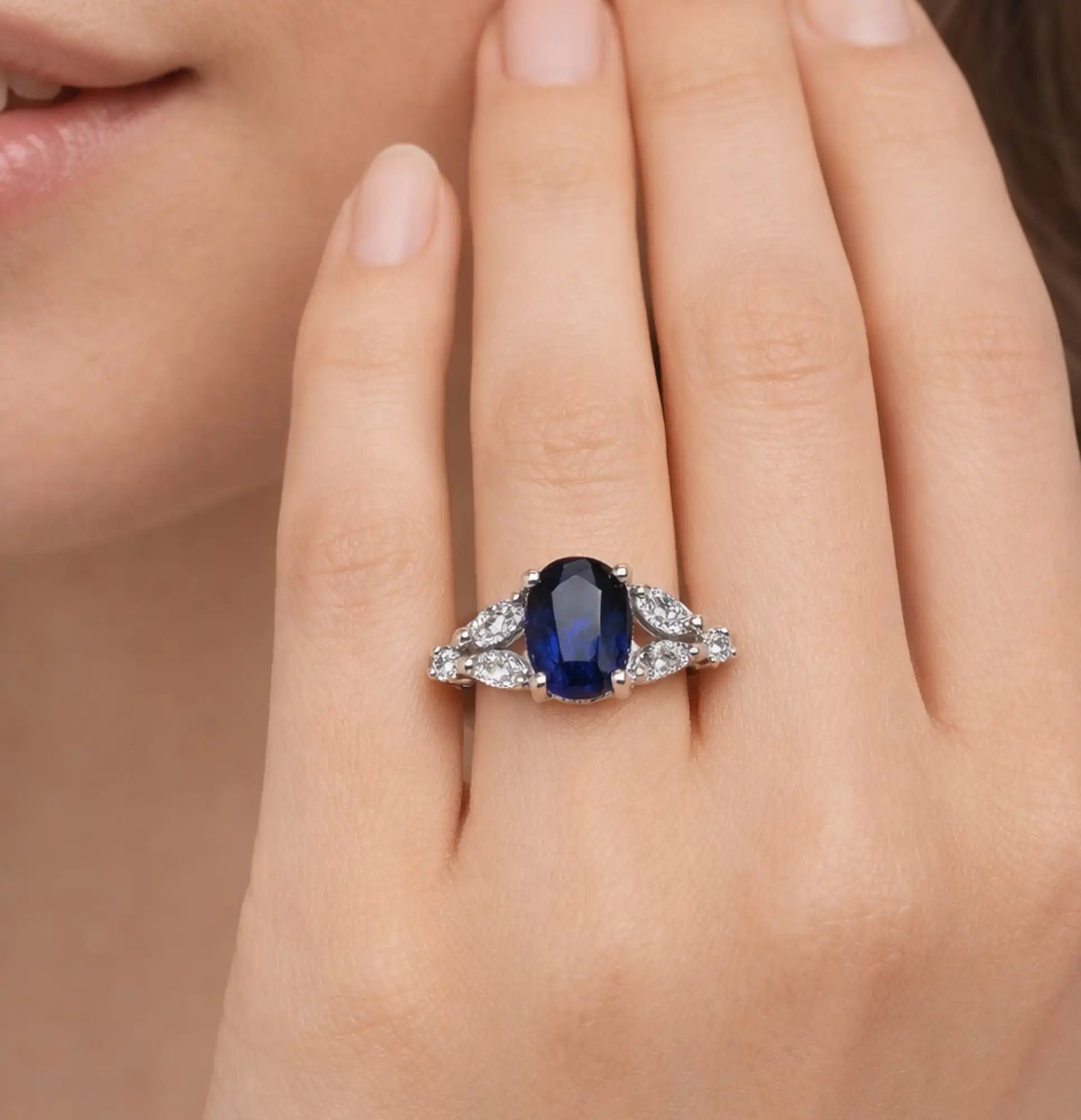 Stainless steel blue sapphire CZ ring shown at an angle to show the sparkle