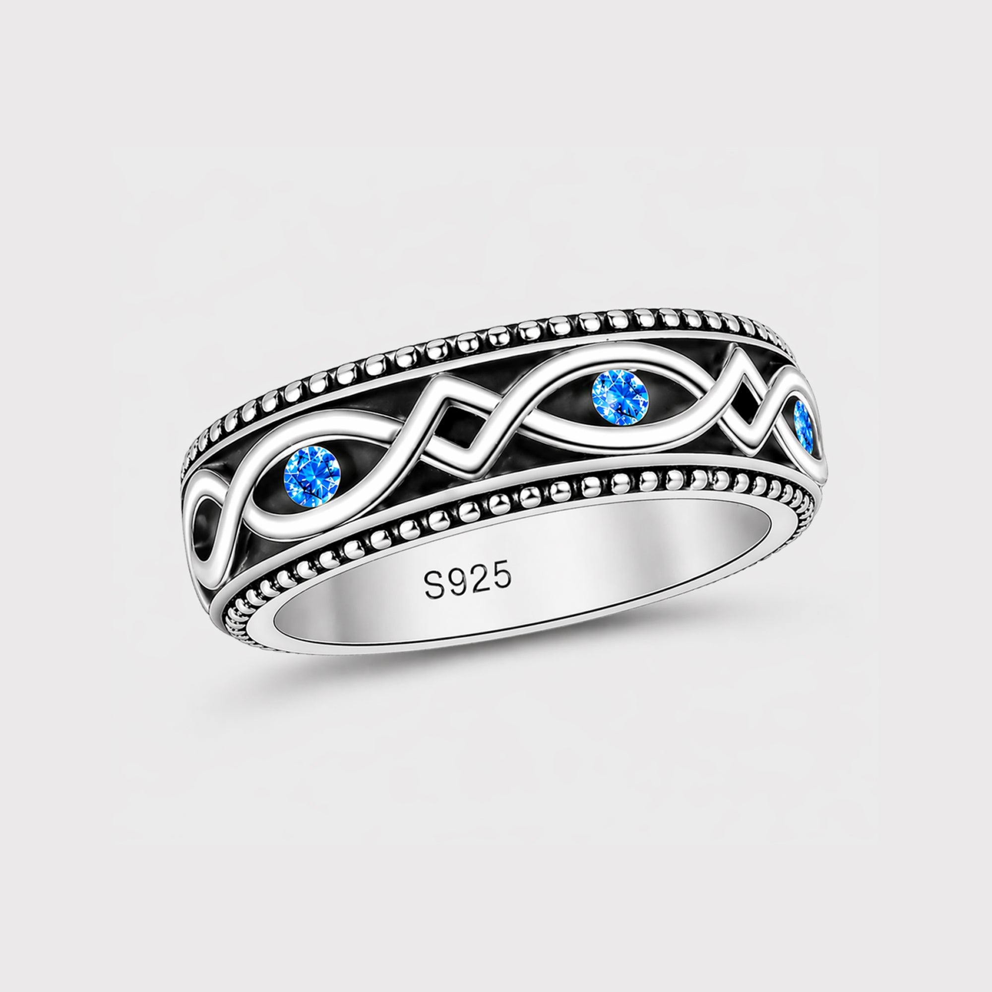 Sterling silver spinning band evil eye ring, top view